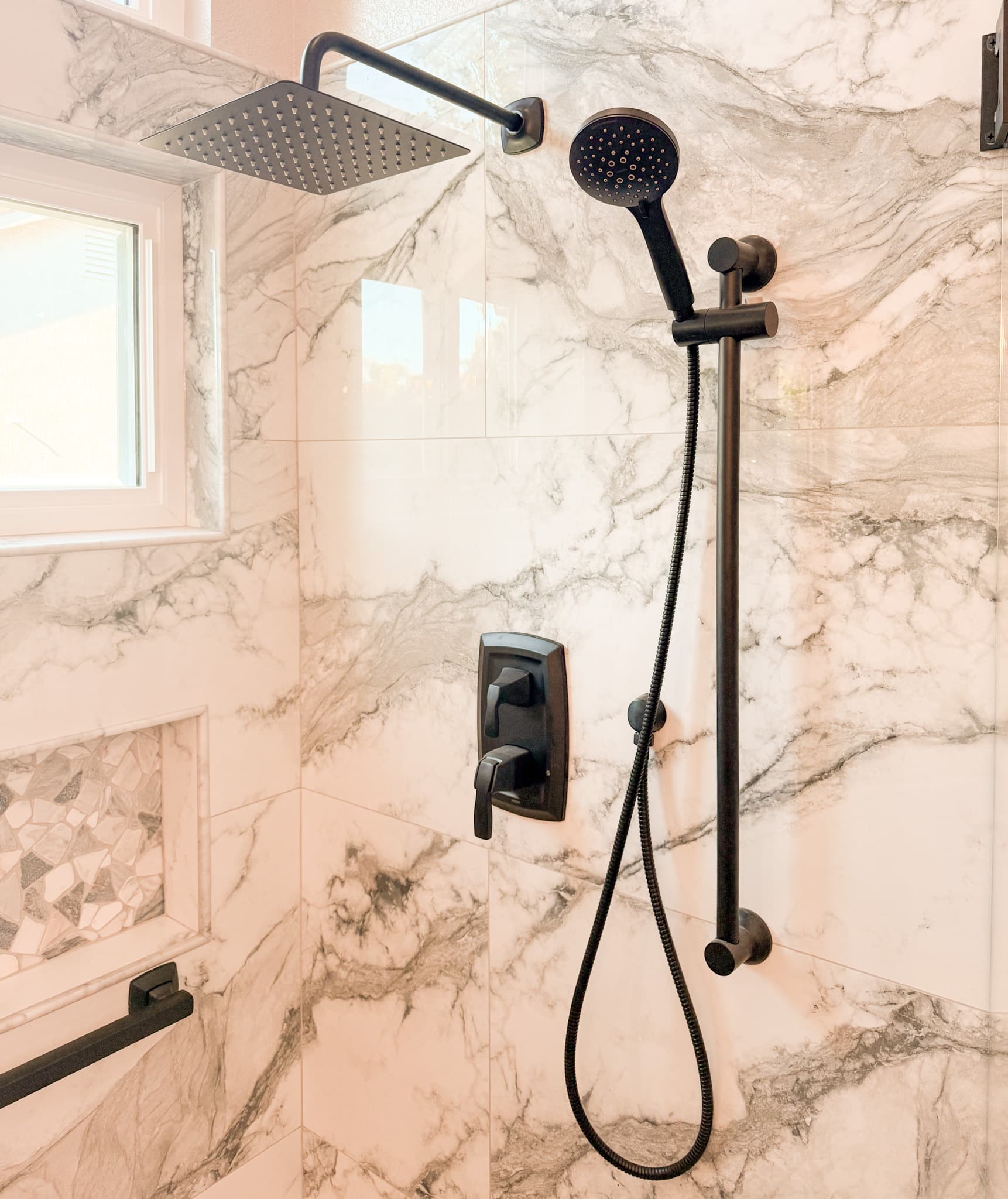 Bathroom Remodel in El Dorado Hills — walk-in shower, tiled shower surround, rain shower head, handheld shower, mosaic backsplash