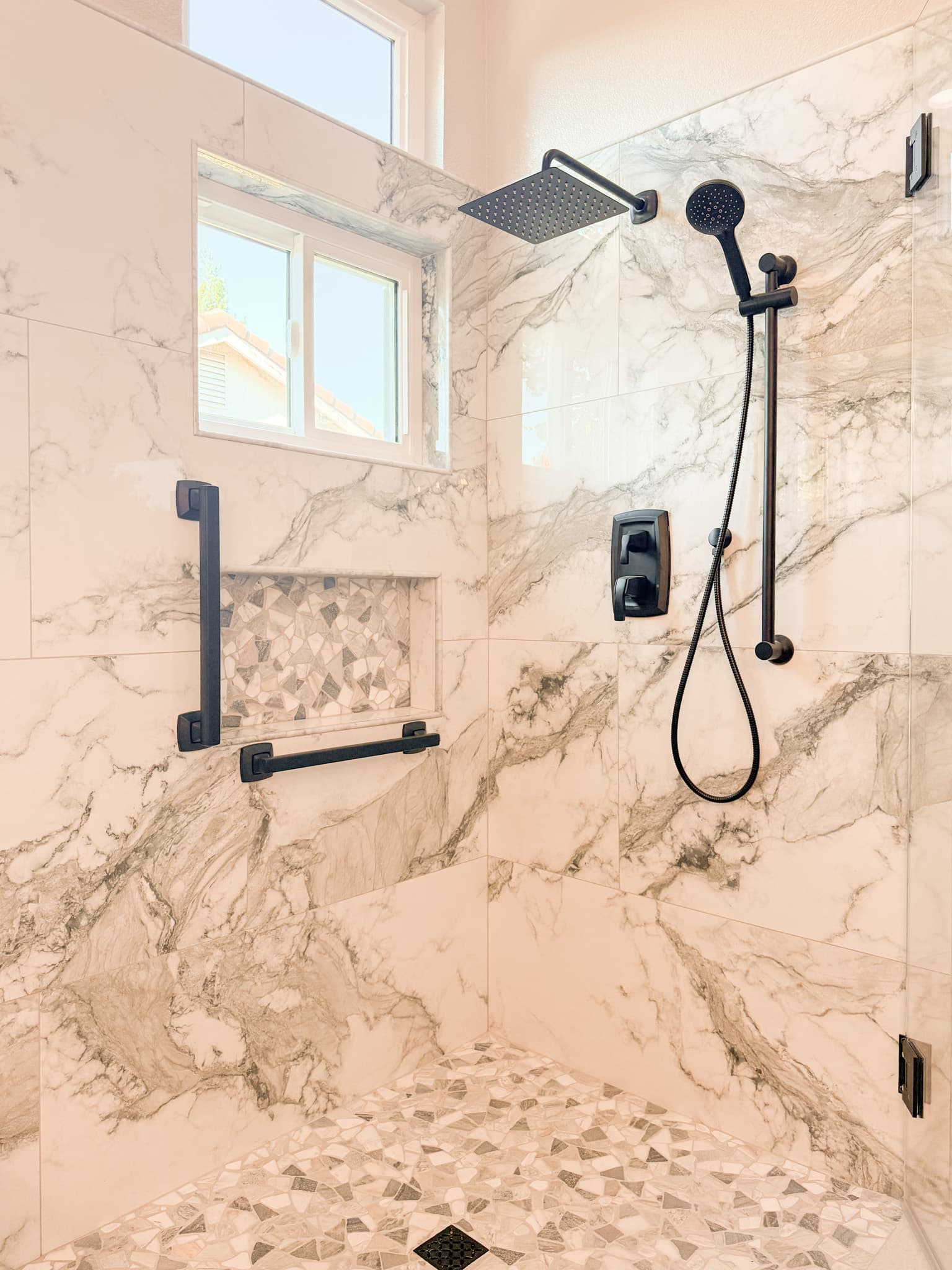 Bathroom Remodel in El Dorado Hills — walk-in shower, frameless glass shower, tiled shower surround, rain shower head, handheld shower