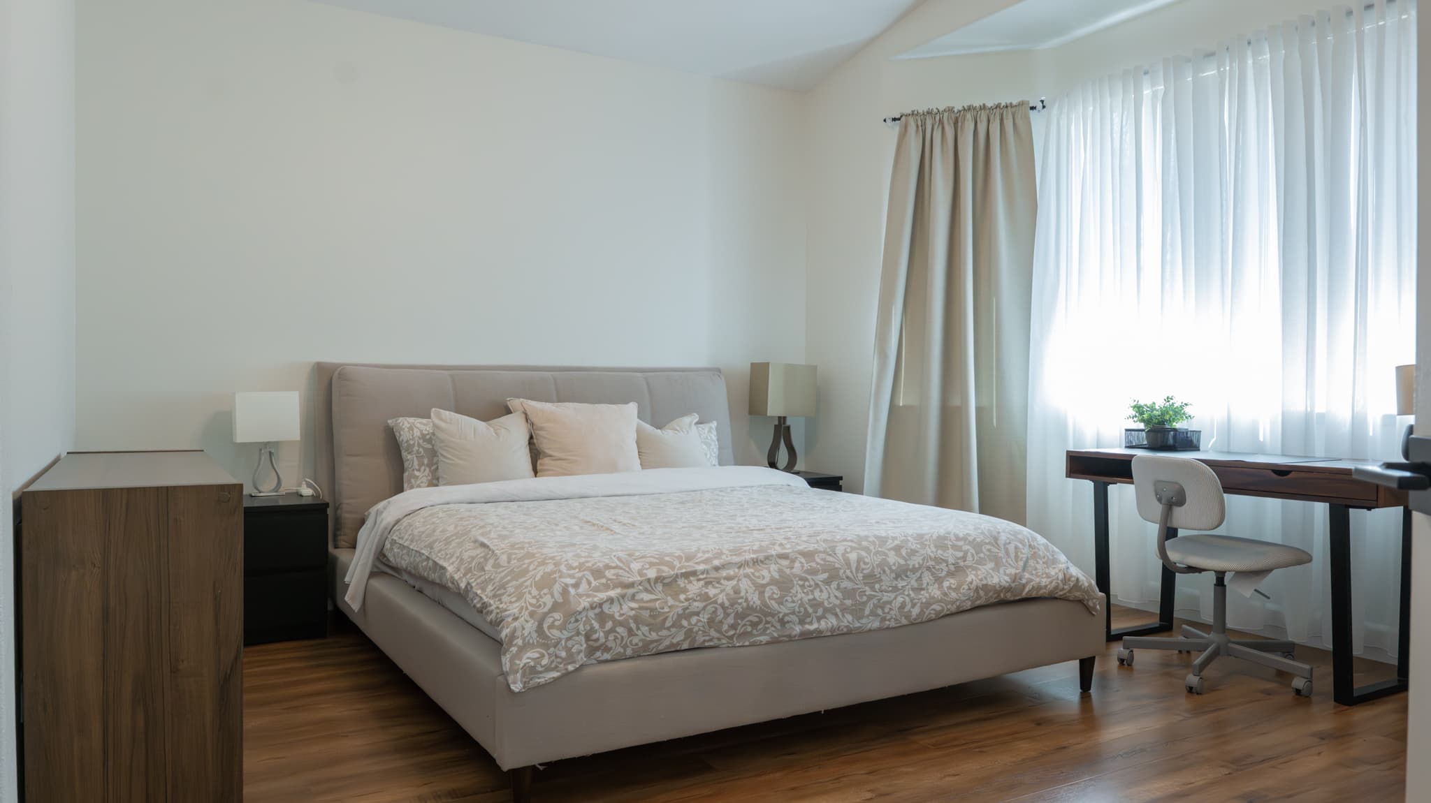 House Renovation in Roseville — hardwood flooring, open-concept layout, recessed lighting, built-in shelving, crown moulding