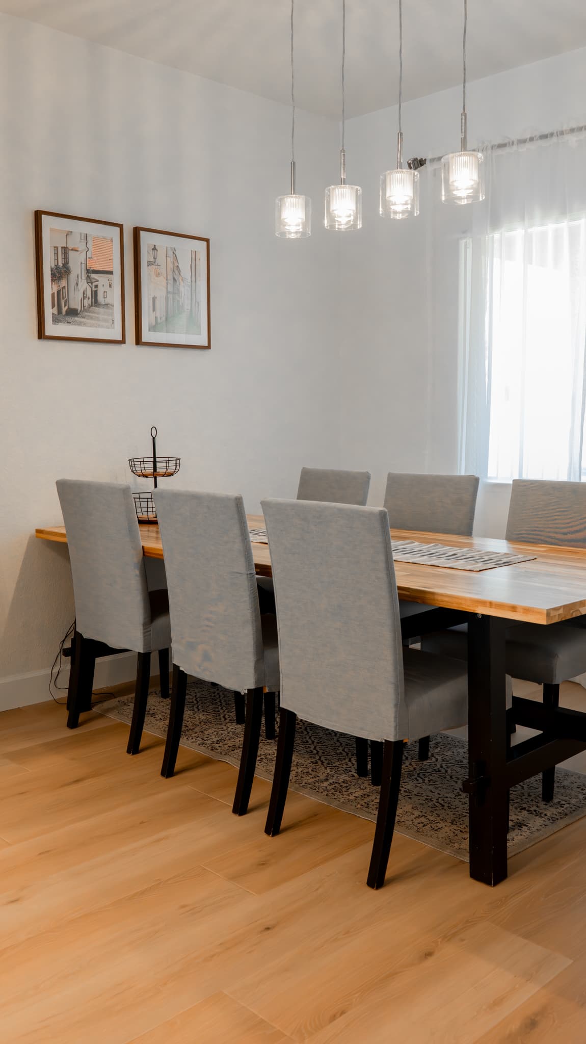House Renovation in Roseville — pendant lighting, hardwood flooring, butcher-block countertop, open-concept layout