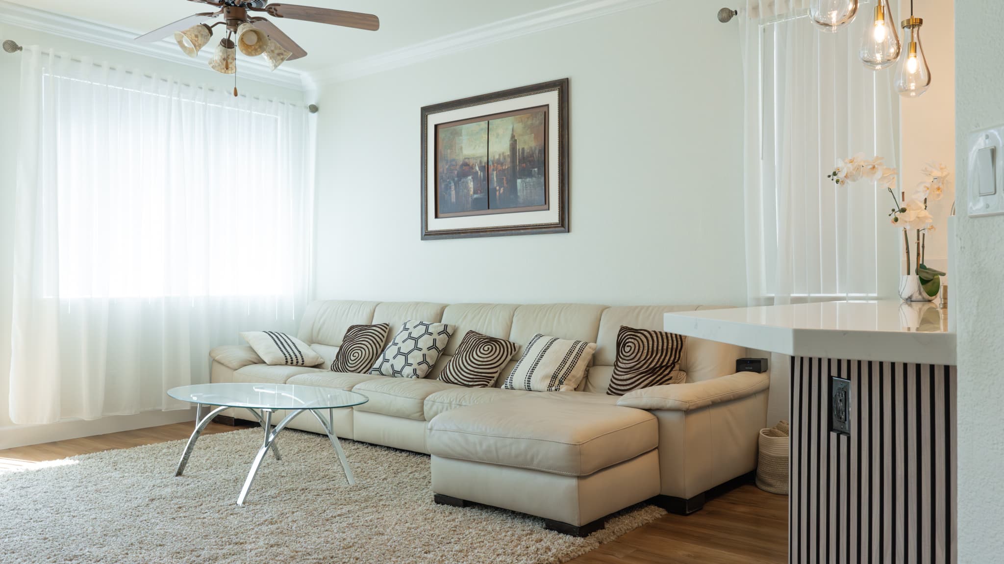 House Renovation in Roseville — crown moulding, pendant lighting, hardwood flooring, open-concept layout, luxury vinyl plank