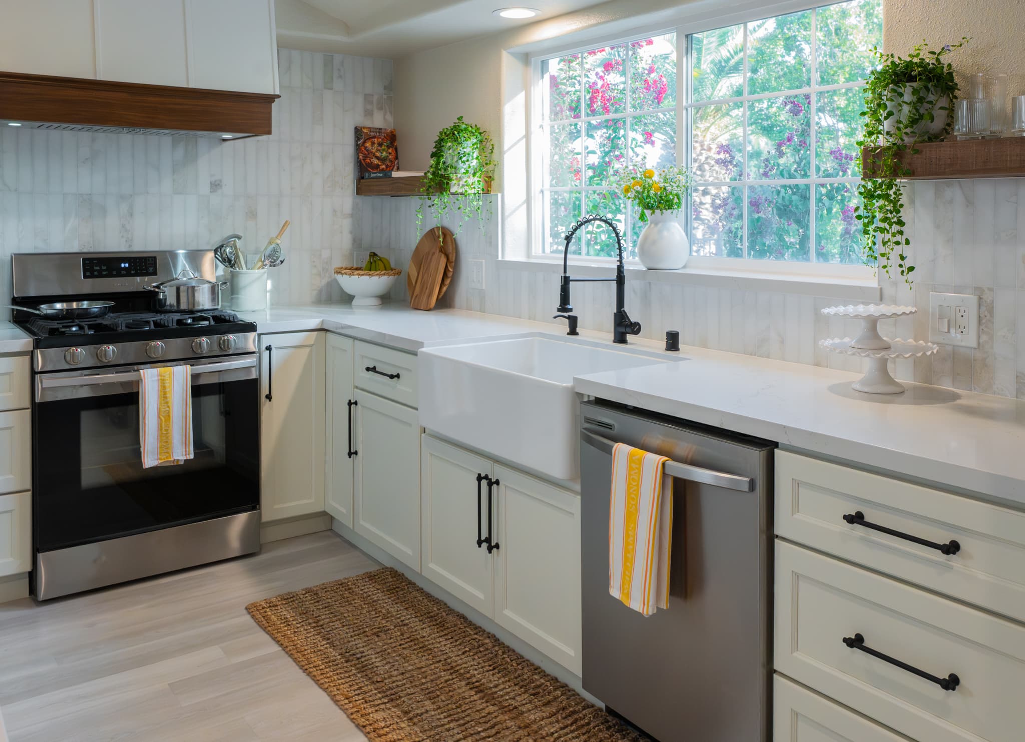 Kitchen Remodel in Rocklin — shaker cabinets, farmhouse sink, natural-stone backsplash, stainless appliances, quartz countertop