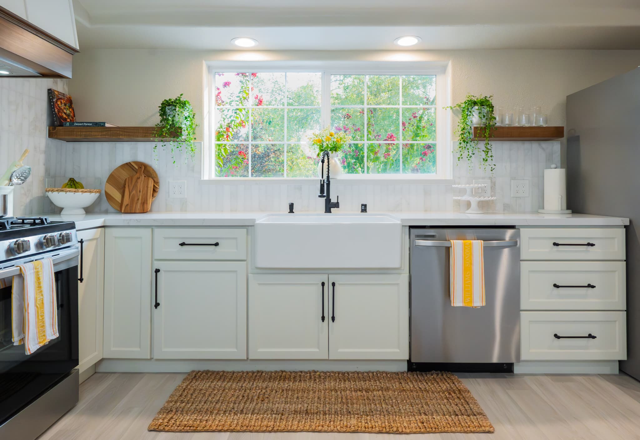 Kitchen Remodel in Rocklin — farmhouse sink, raised-panel cabinets, quartz countertop, recessed lighting, stainless appliances