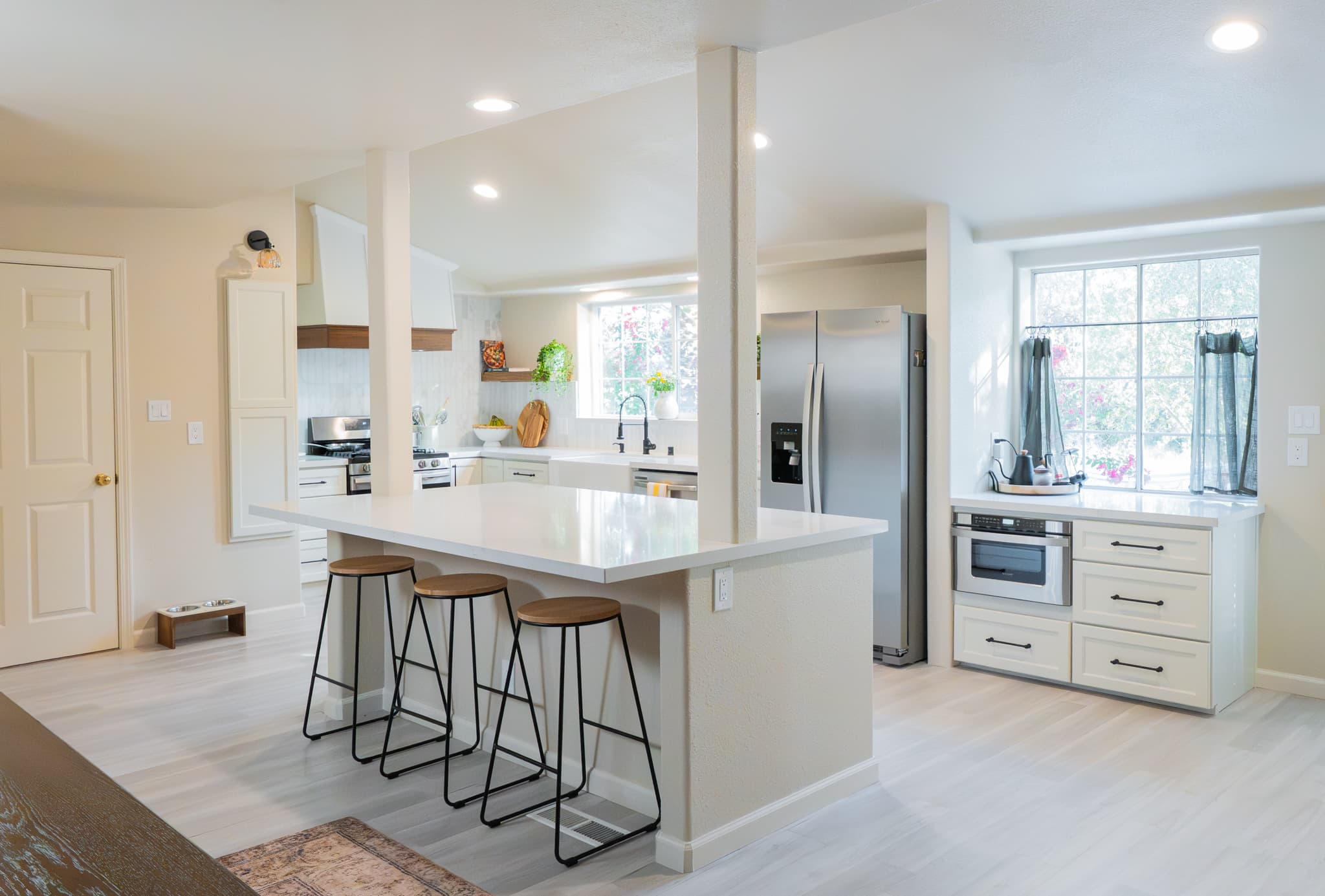 Kitchen Remodel in Rocklin — kitchen island, breakfast bar, quartz countertop, recessed lighting, stainless appliances