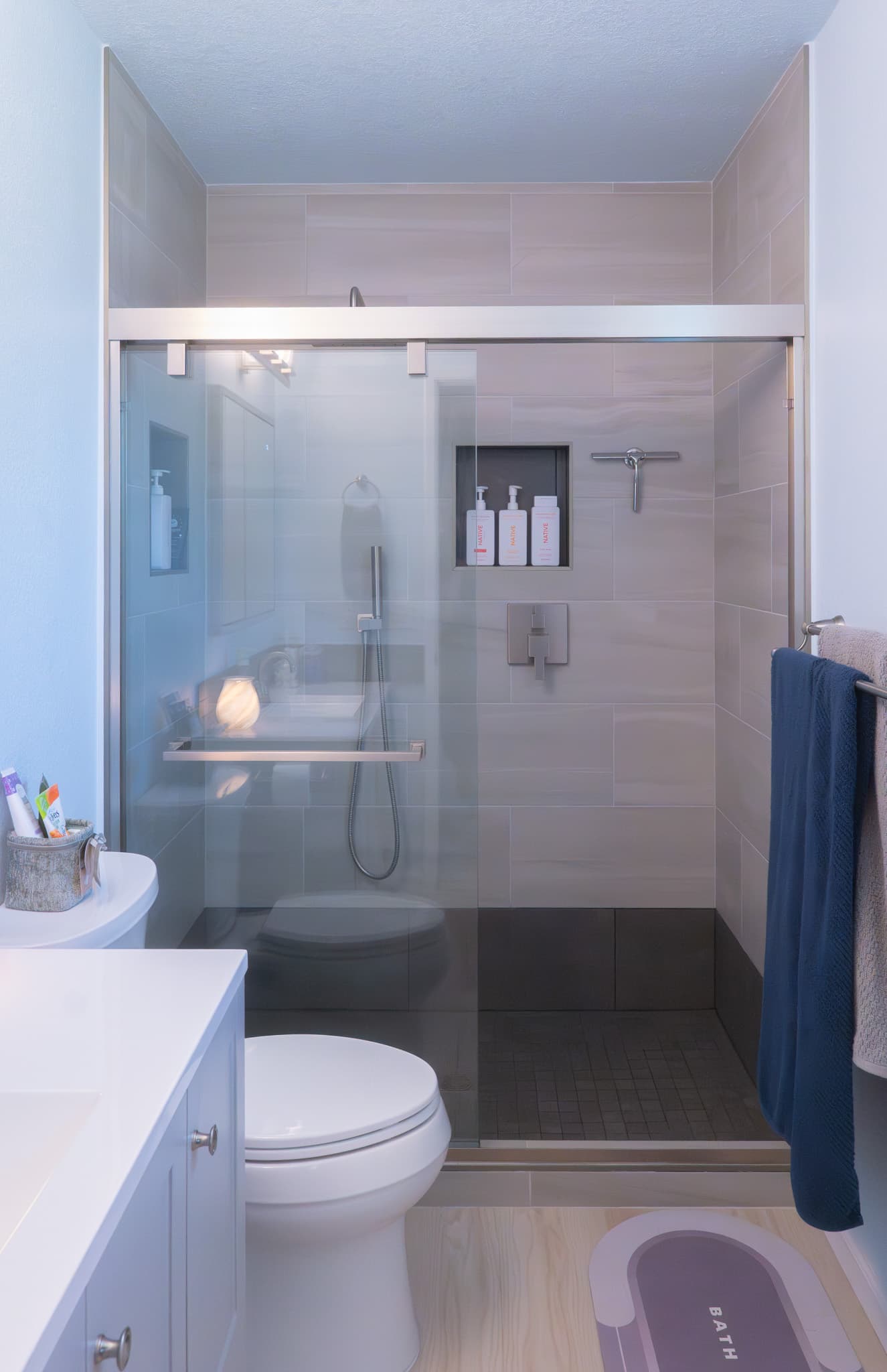 Kitchen Remodel in Sacramento — walk-in shower, tiled shower surround, frameless glass shower, handheld shower, single vanity