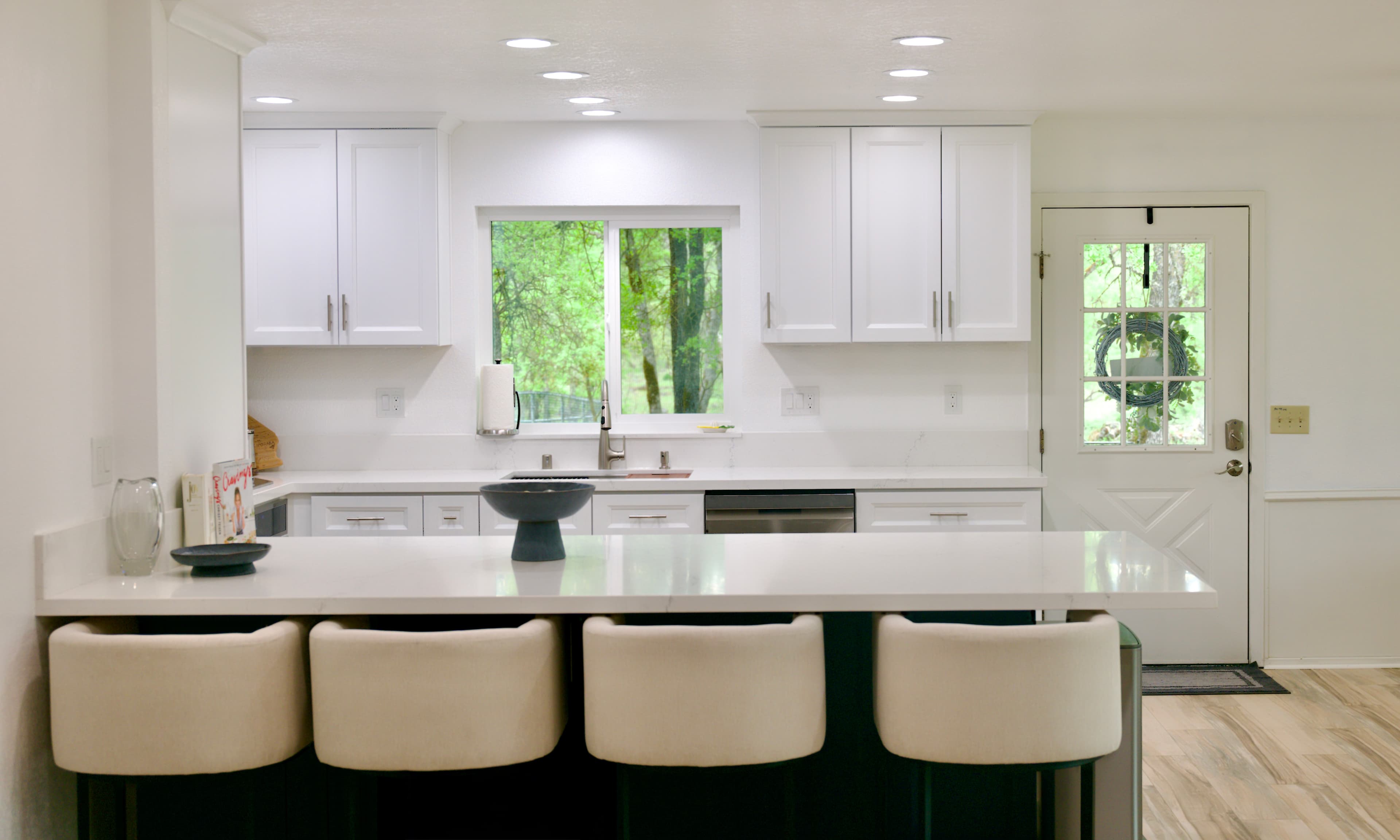 Kitchen Remodel in Sacramento — shaker cabinets, quartz countertop, breakfast bar, recessed lighting, undermount sink