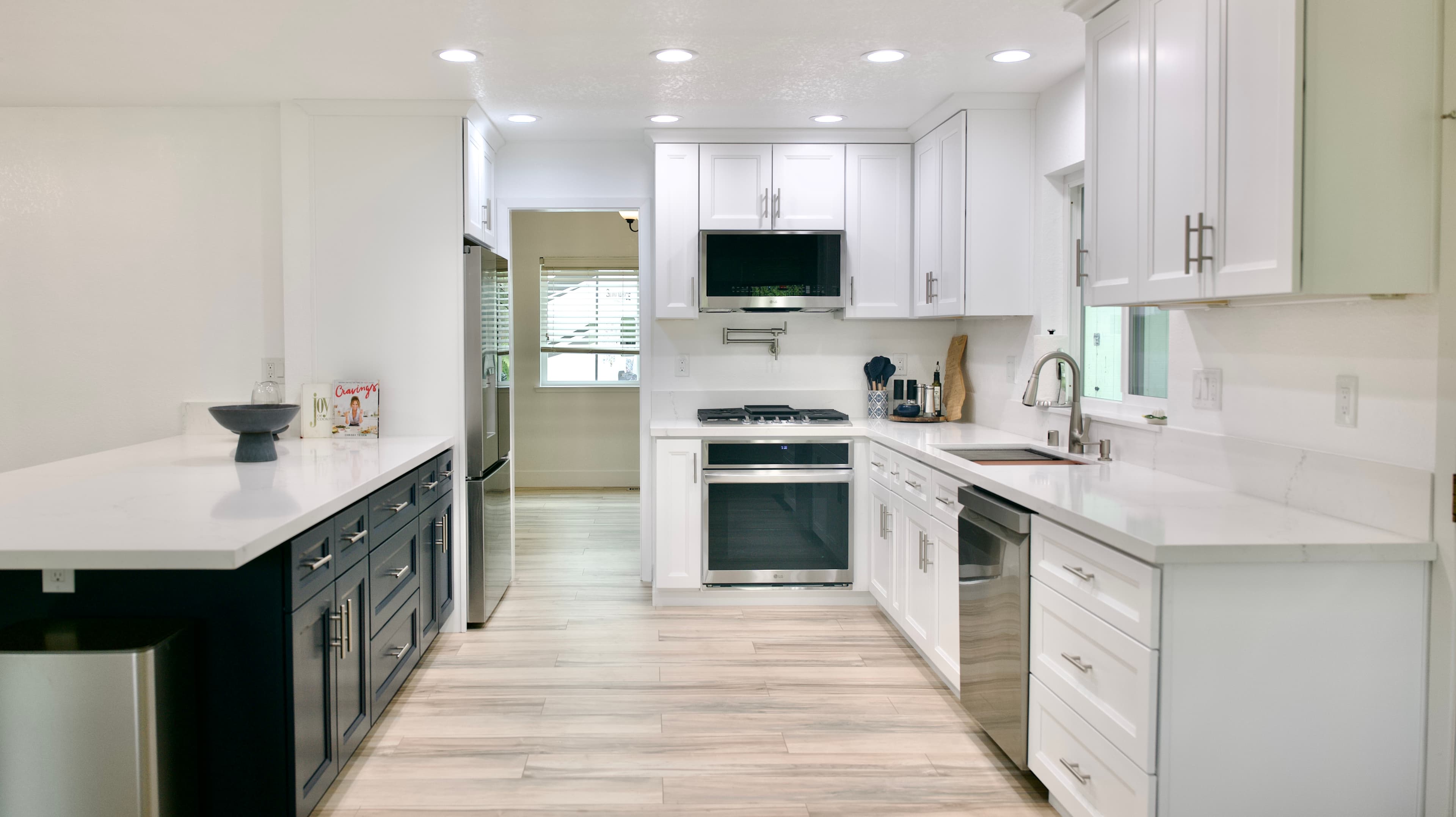 Kitchen Remodel in Sacramento — two-tone cabinetry, shaker cabinets, quartz countertop, stainless appliances, recessed lighting