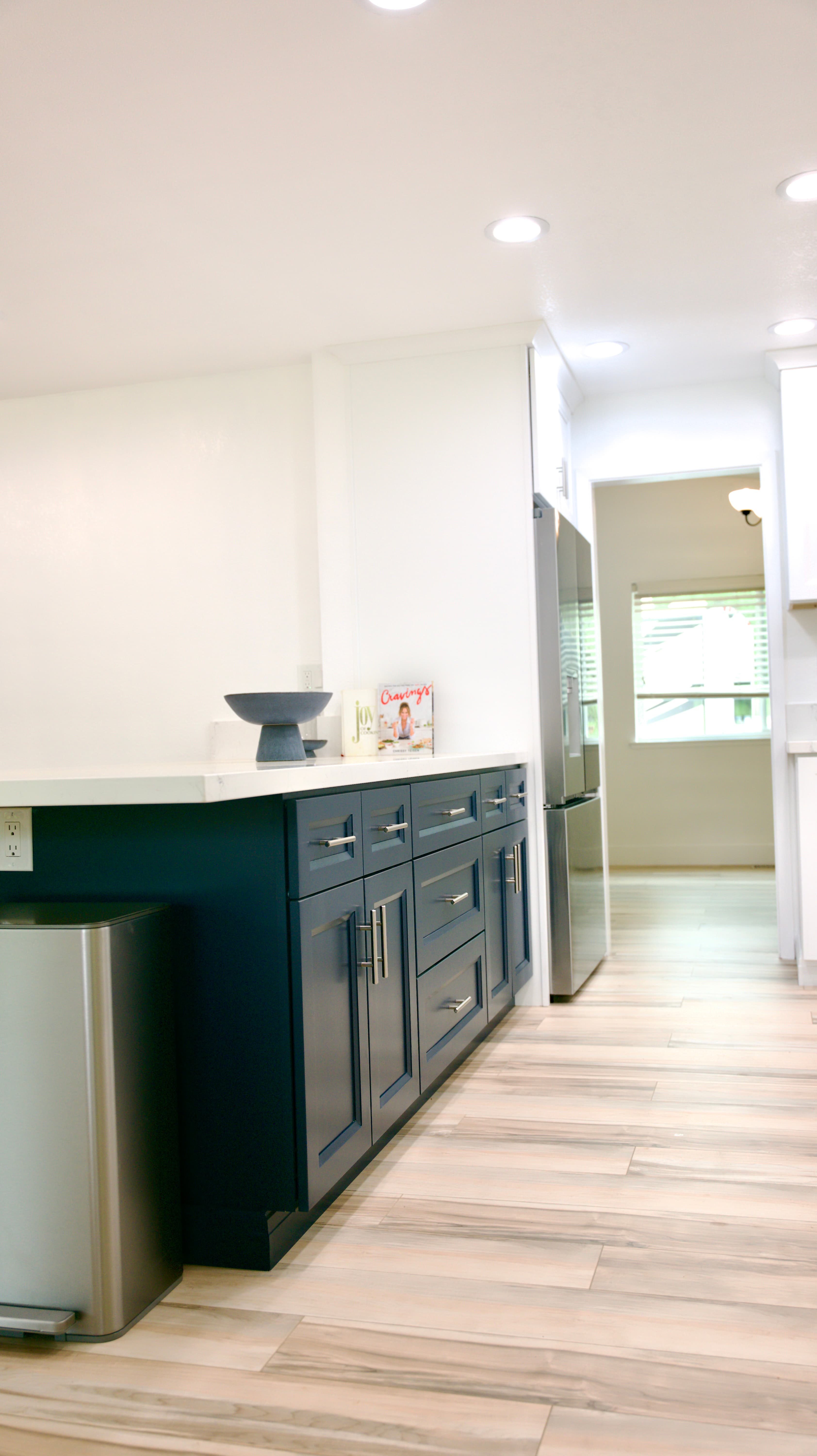Kitchen Remodel in Sacramento — shaker cabinets, quartz countertop, recessed lighting, stainless appliances, porcelain tile flooring