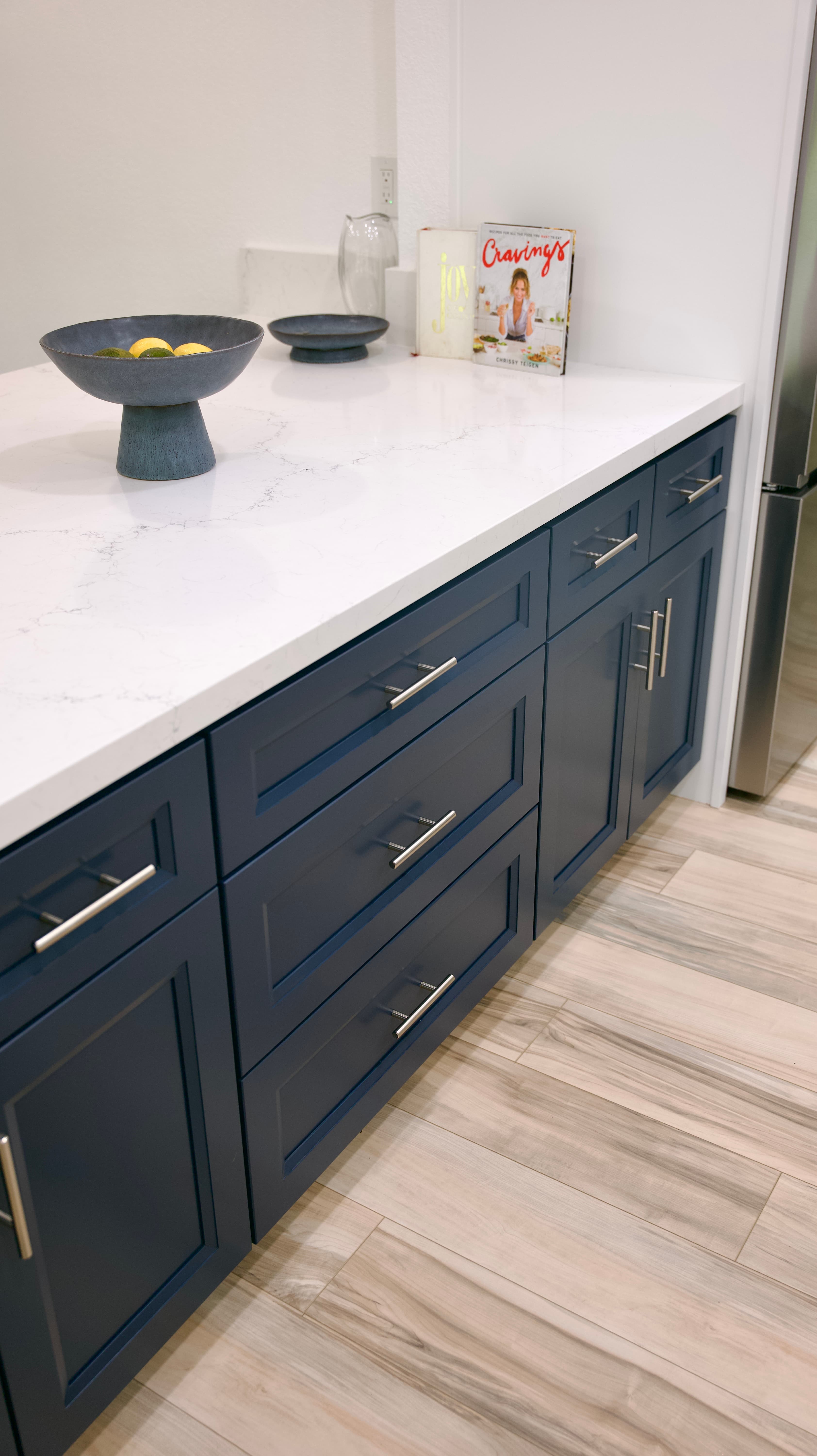 Kitchen Remodel in Sacramento — shaker cabinets, quartz countertop, kitchen island, porcelain tile flooring, stainless appliances