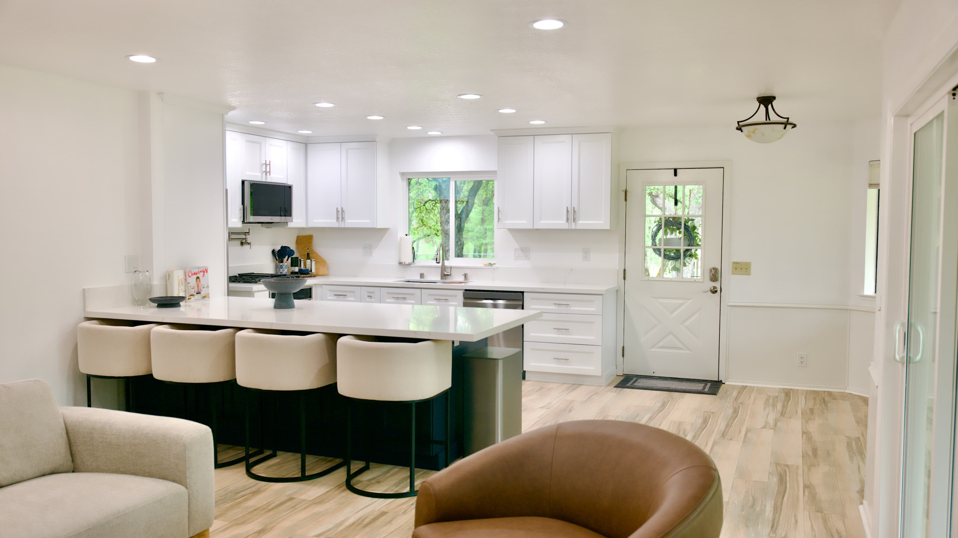 Kitchen Remodel in Sacramento — shaker cabinets, kitchen island, quartz countertop, recessed lighting, open-concept layout