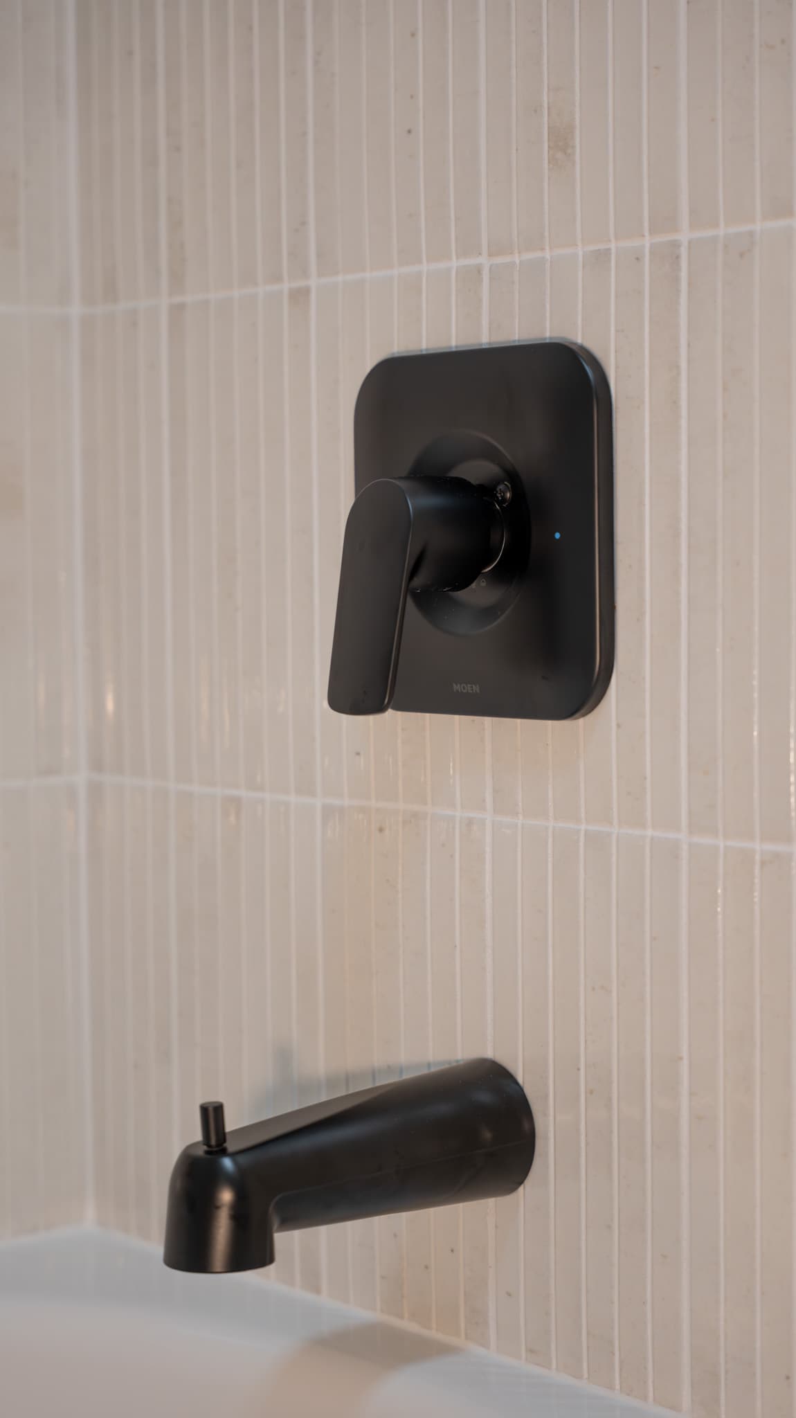 Bathroom Remodel in Folsom — tiled shower surround, soaking tub, natural-stone tile flooring