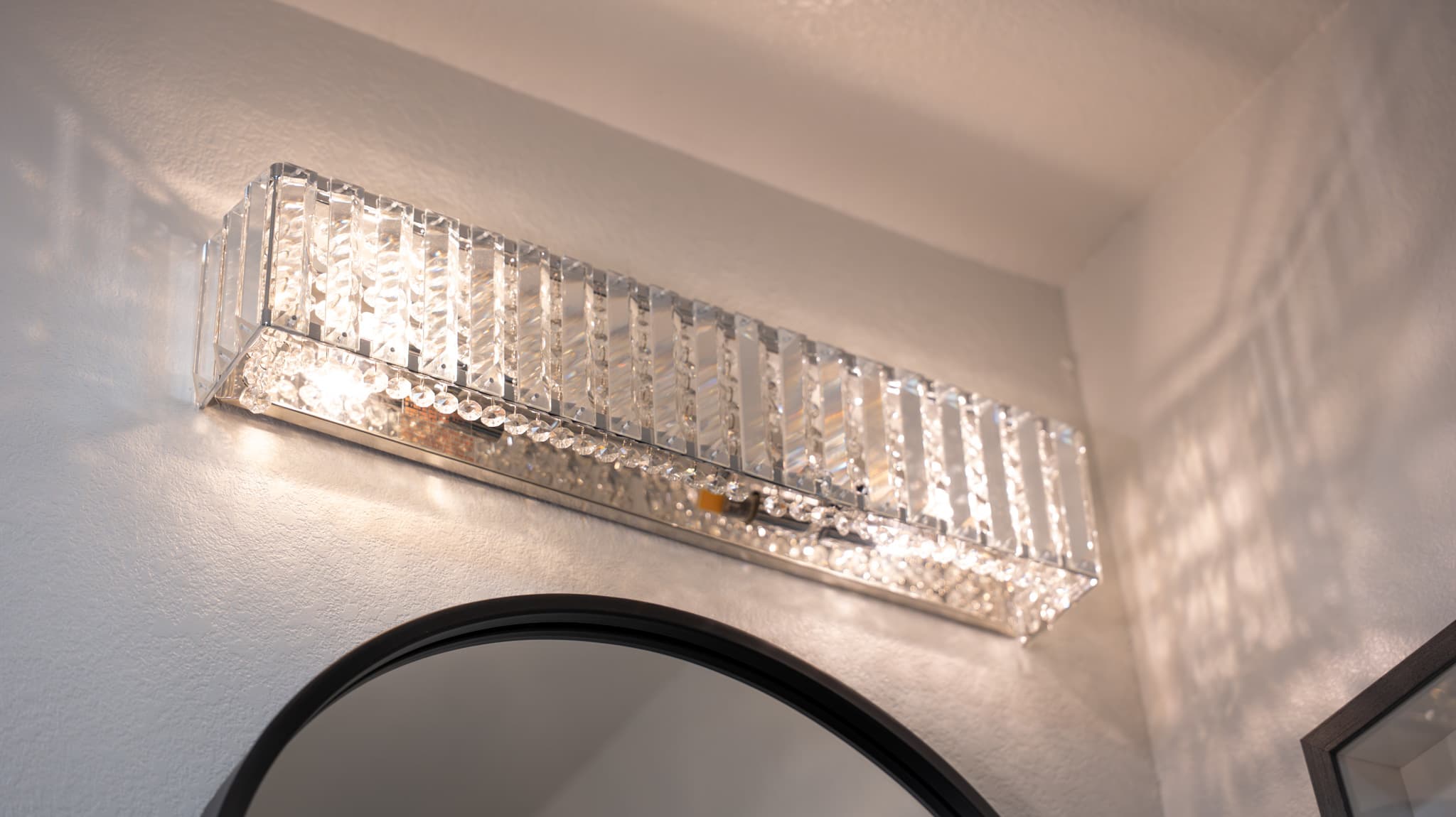 Bathroom Remodel in Folsom — lighted mirror, framed mirror, recessed lighting, single vanity