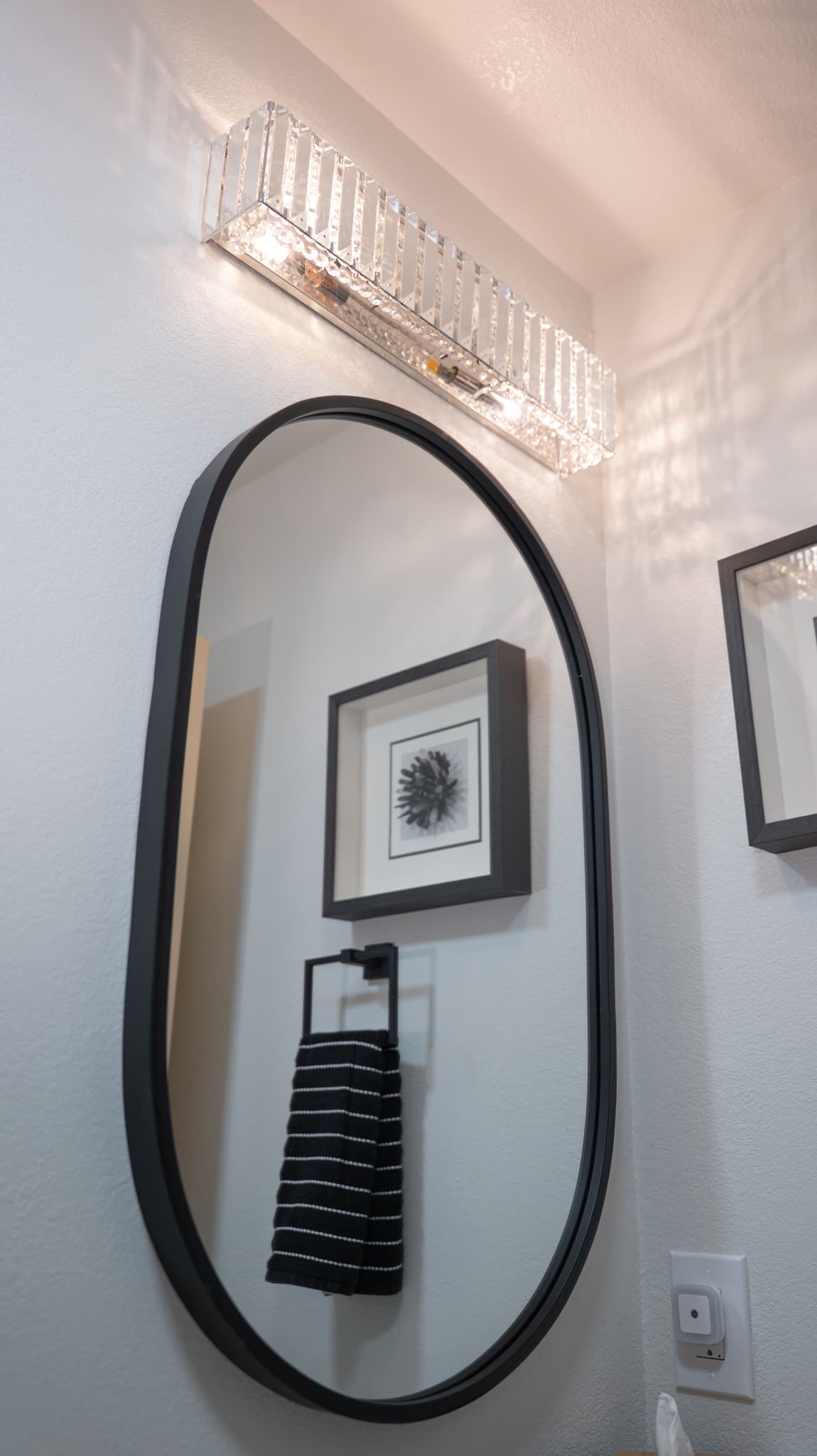 Bathroom Remodel in Folsom — framed mirror, lighted mirror, single vanity, pendant lighting