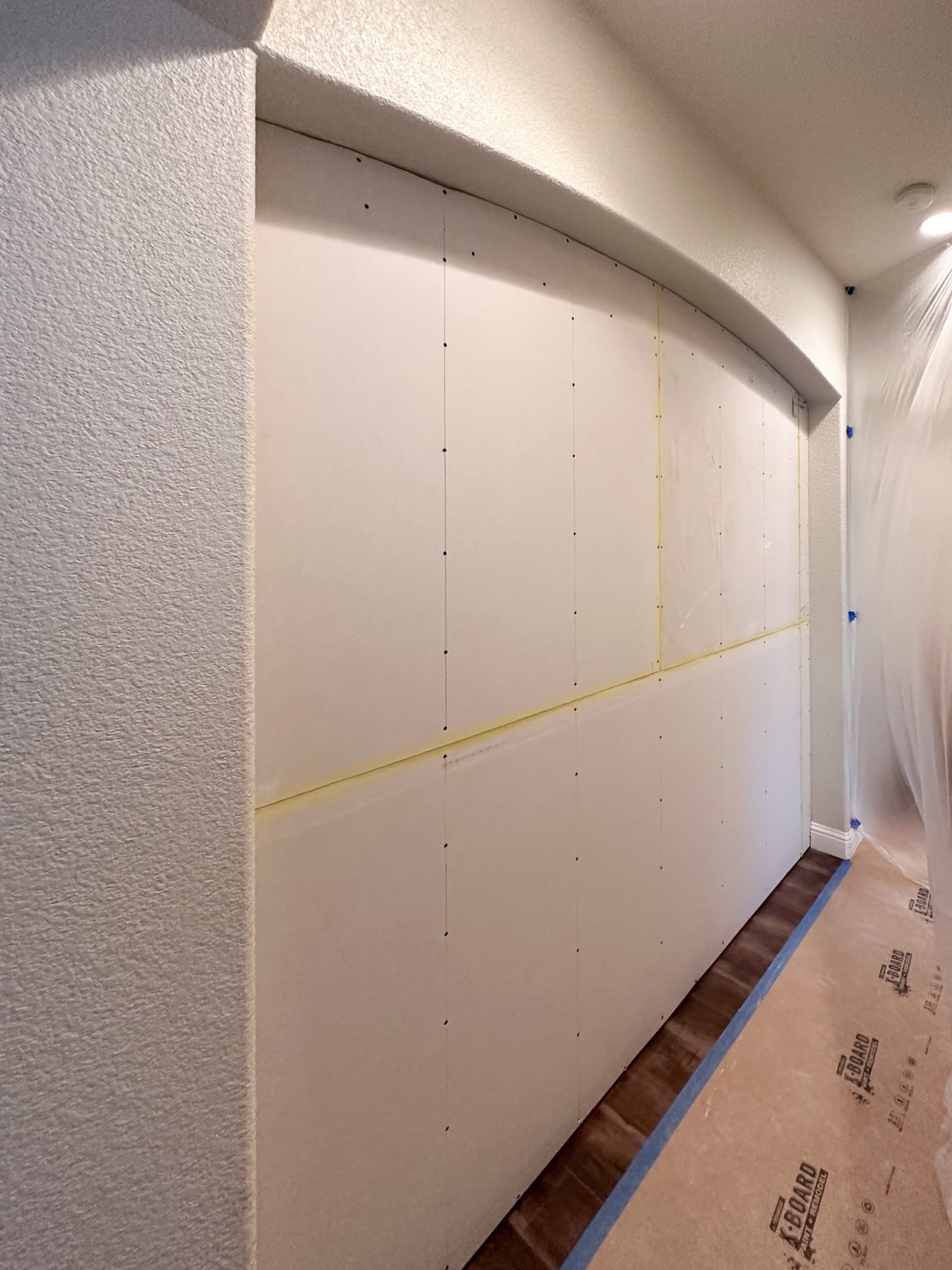 House Renovation in Citrus Heights — framing stage, hardwood flooring, recessed lighting, wainscoting, built-in shelving