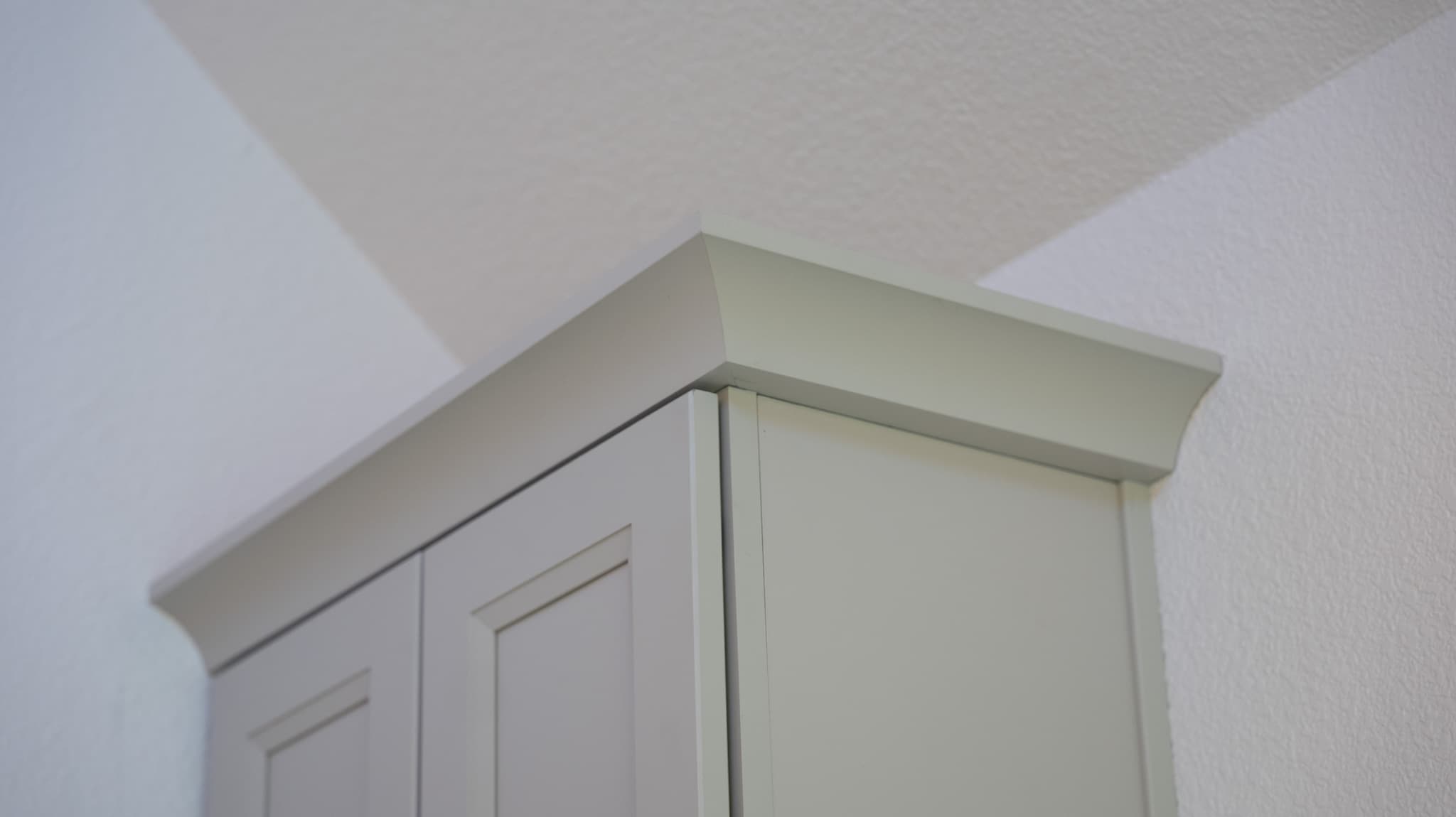Bathroom Remodel in Sacramento — raised-panel cabinets, crown moulding, custom cabinetry, linen tower