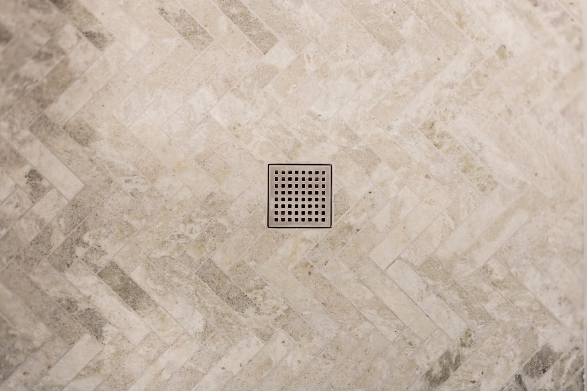 Bathroom Remodel in Sacramento — walk-in shower, natural-stone tile flooring, tiled shower surround, marble tile flooring