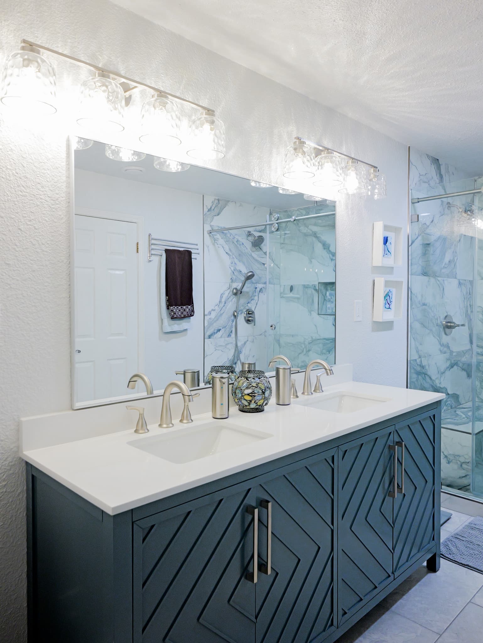 Bathroom Remodel in Sacramento — double vanity, undermount sink, frameless glass shower, tiled shower surround, quartz countertop