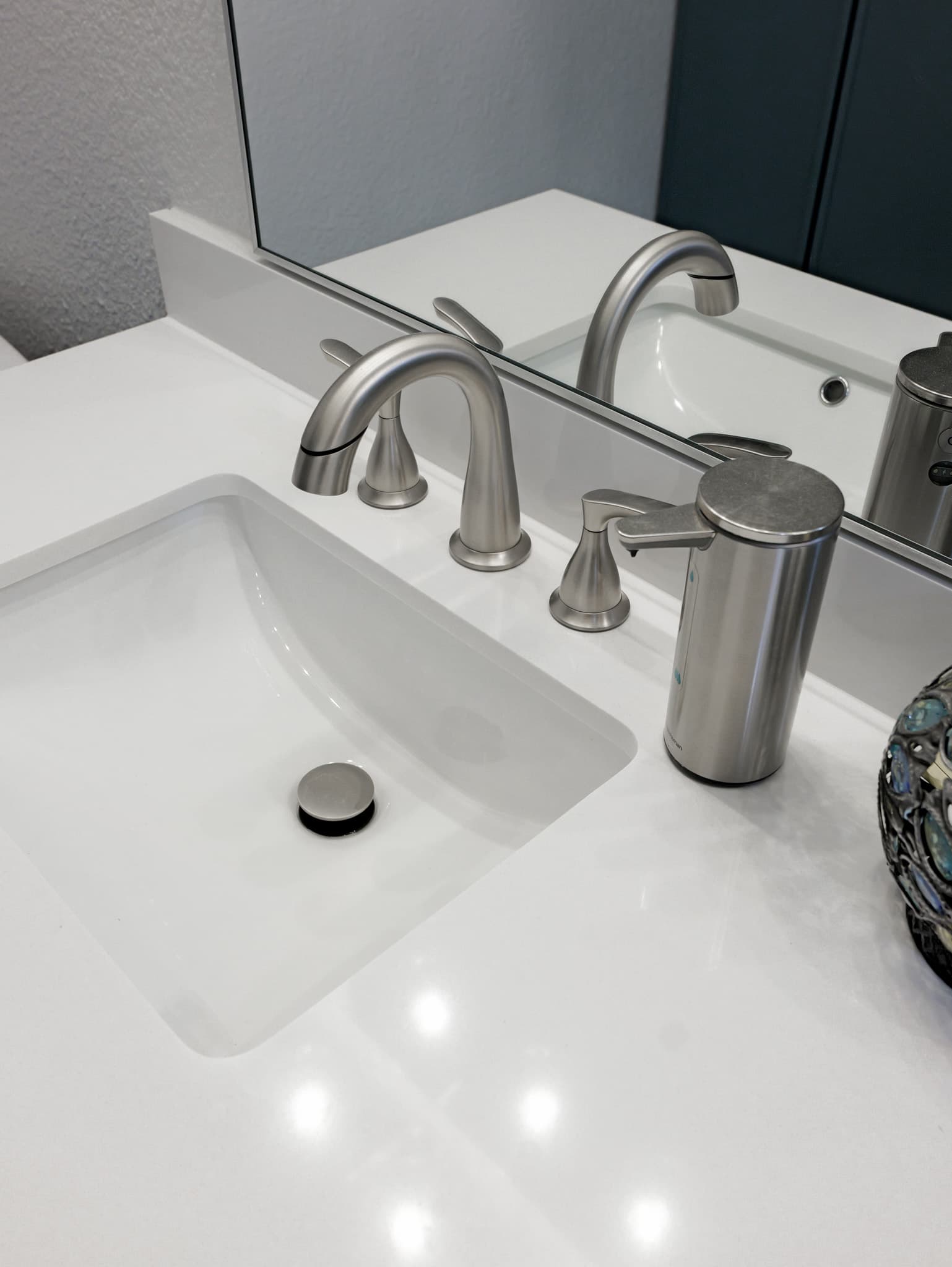 Bathroom Remodel in Sacramento — undermount sink, quartz countertop, single vanity, framed mirror