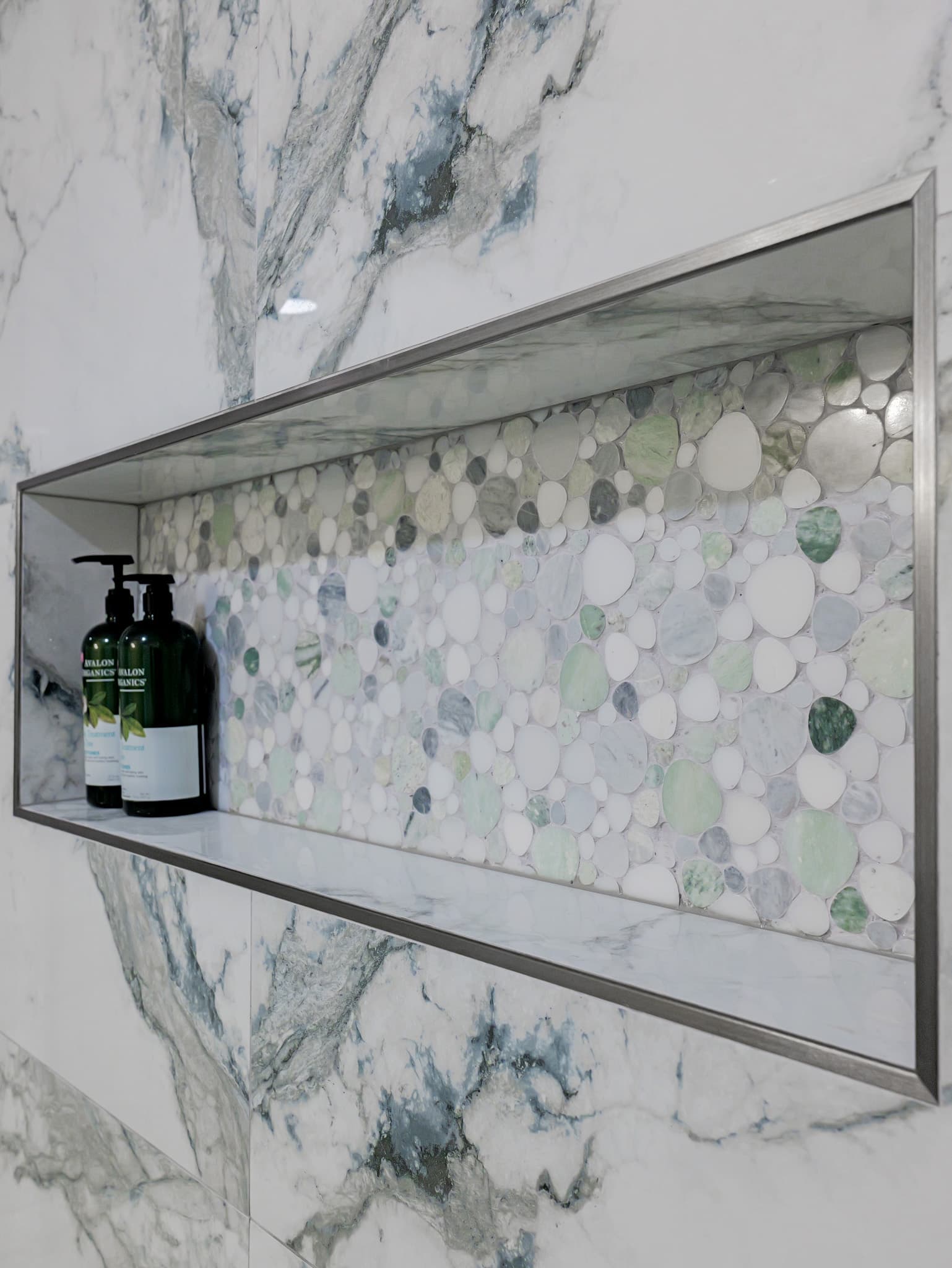 Bathroom Remodel in Sacramento — tiled shower surround, mosaic backsplash, natural-stone backsplash, marble tile flooring, walk-in shower