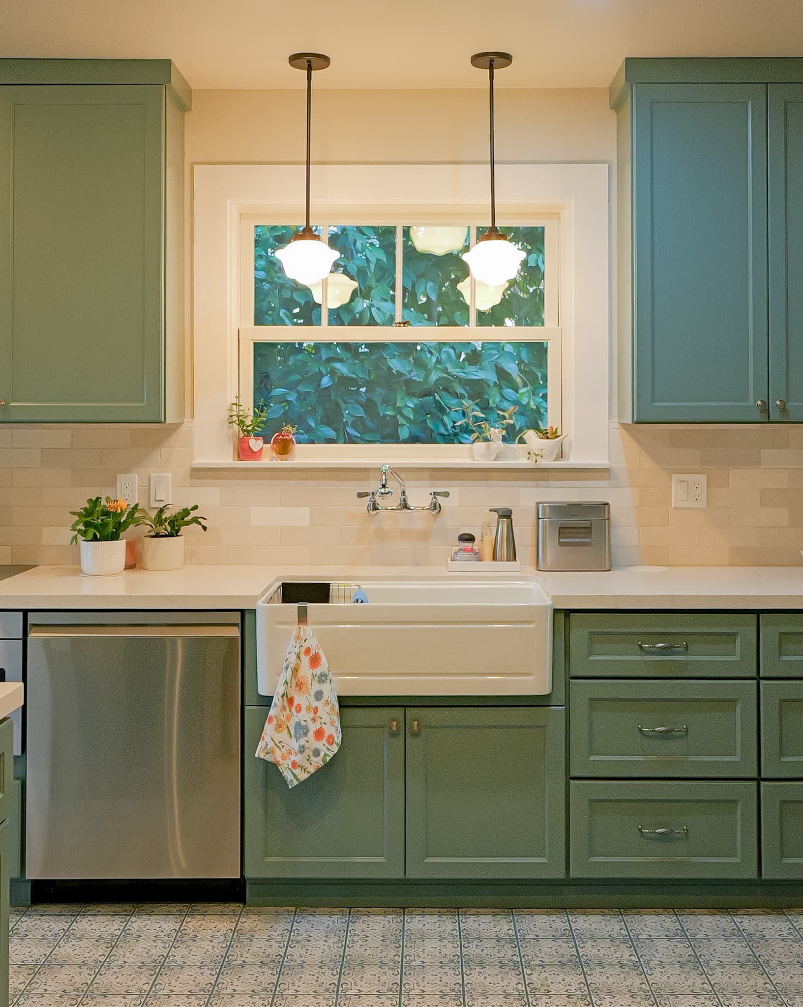 Kitchen Remodel in Sacramento — farmhouse sink, pendant lighting, subway tile backsplash, raised-panel cabinets, stainless appliances