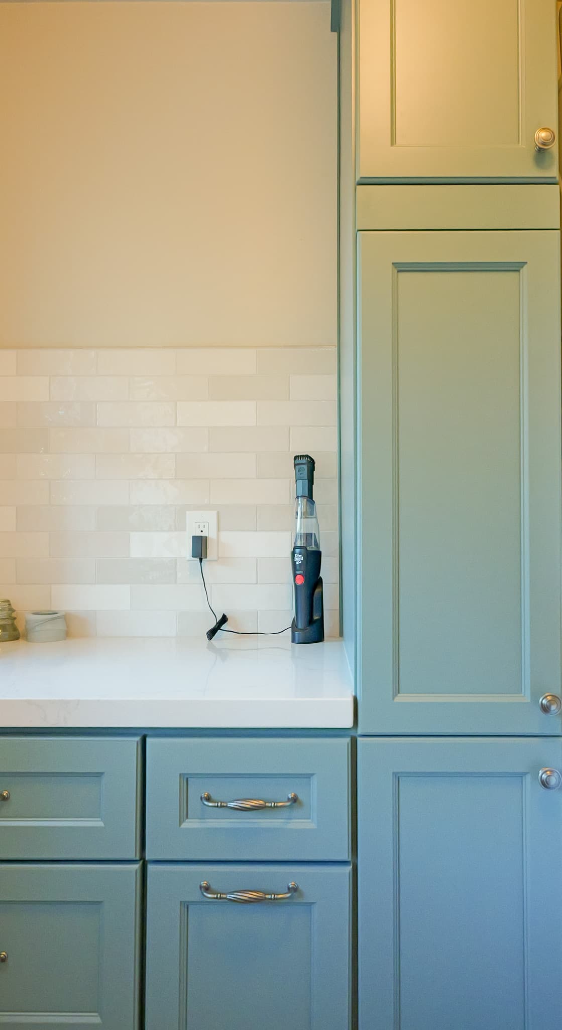 Kitchen Remodel in Sacramento — raised-panel cabinets, subway tile backsplash, quartz countertop, custom cabinetry, linen tower