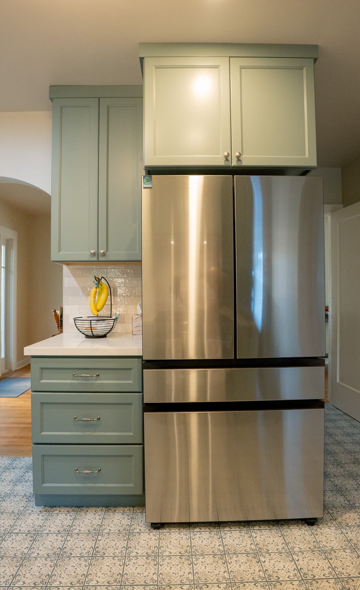 Kitchen Remodel in Sacramento — raised-panel cabinets, stainless appliances, subway tile backsplash, quartz countertop, ceramic tile flooring
