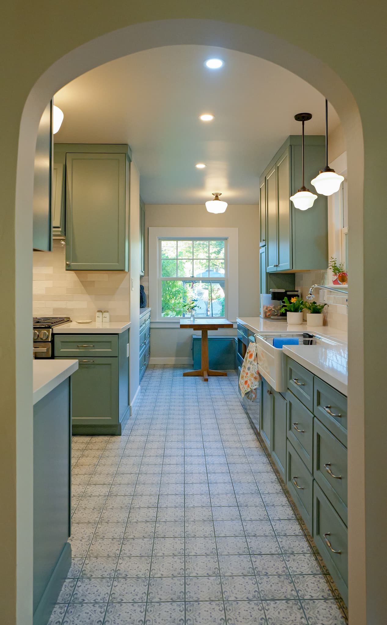 Kitchen Remodel in Sacramento — raised-panel cabinets, subway tile backsplash, farmhouse sink, pendant lighting, recessed lighting
