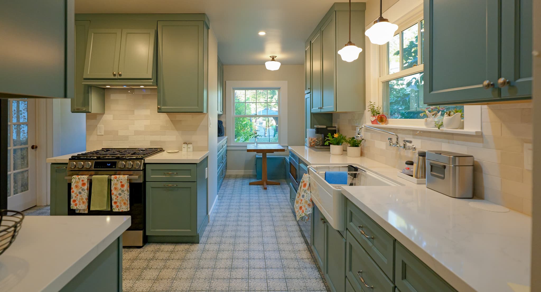 Kitchen Remodel in Sacramento — raised-panel cabinets, farmhouse sink, subway tile backsplash, quartz countertop, pendant lighting