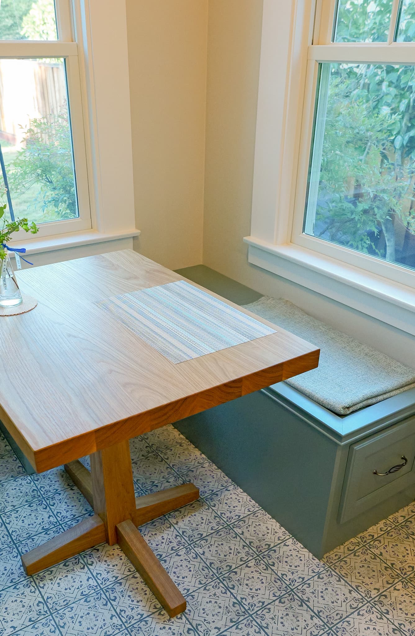 Kitchen Remodel in Sacramento — butcher-block countertop, built-in shelving, ceramic tile flooring, shaker cabinets, breakfast bar