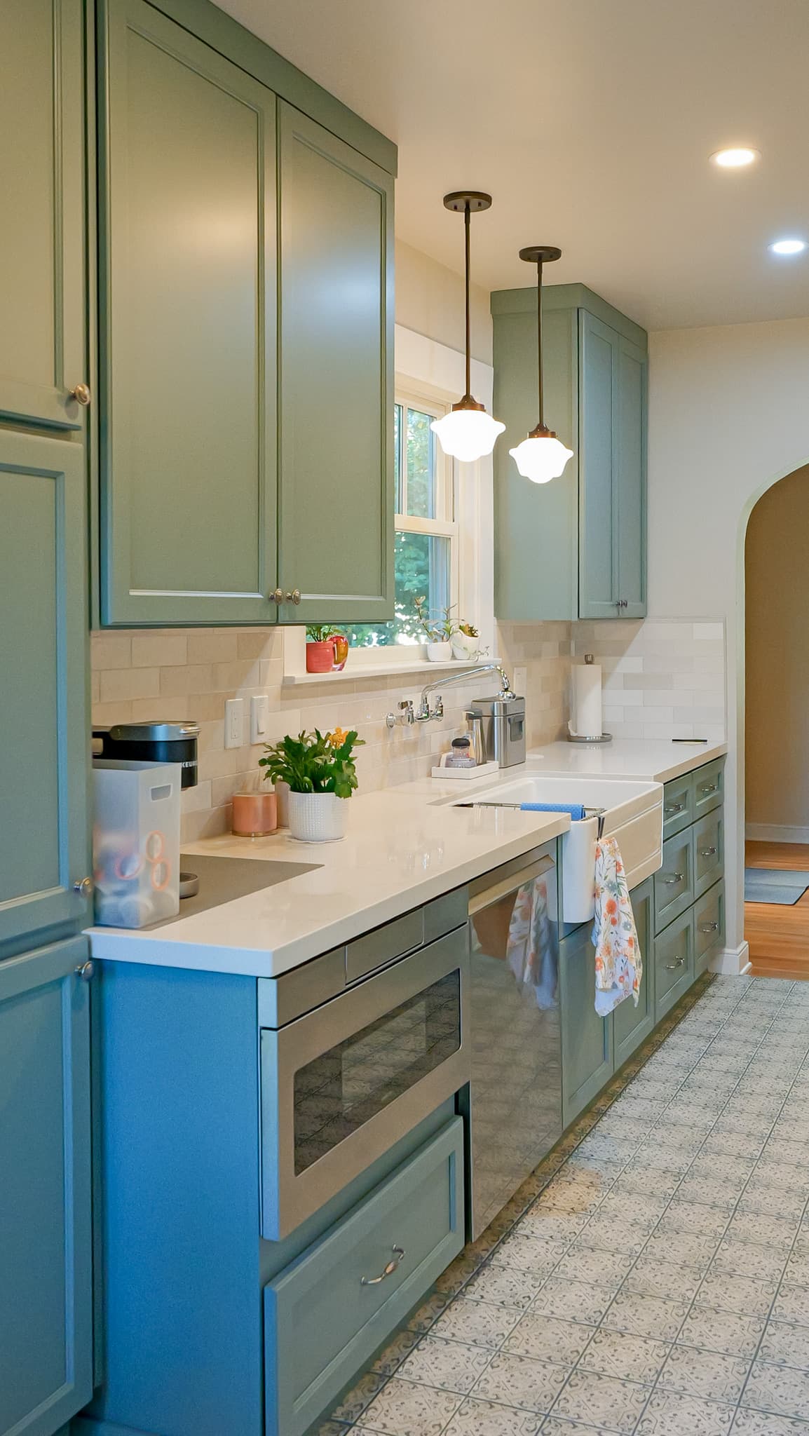 Kitchen Remodel in Sacramento — shaker cabinets, farmhouse sink, subway tile backsplash, pendant lighting, quartz countertop