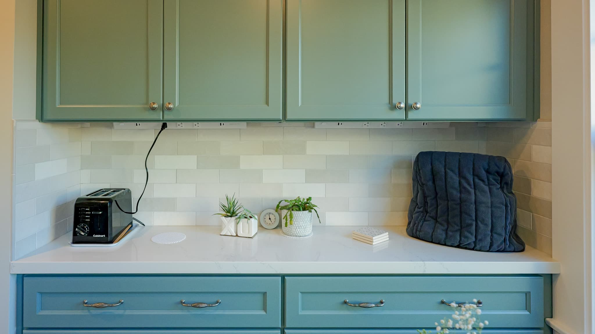 Kitchen Remodel in Sacramento — two-tone cabinetry, raised-panel cabinets, quartz countertop, subway tile backsplash, under-cabinet lighting