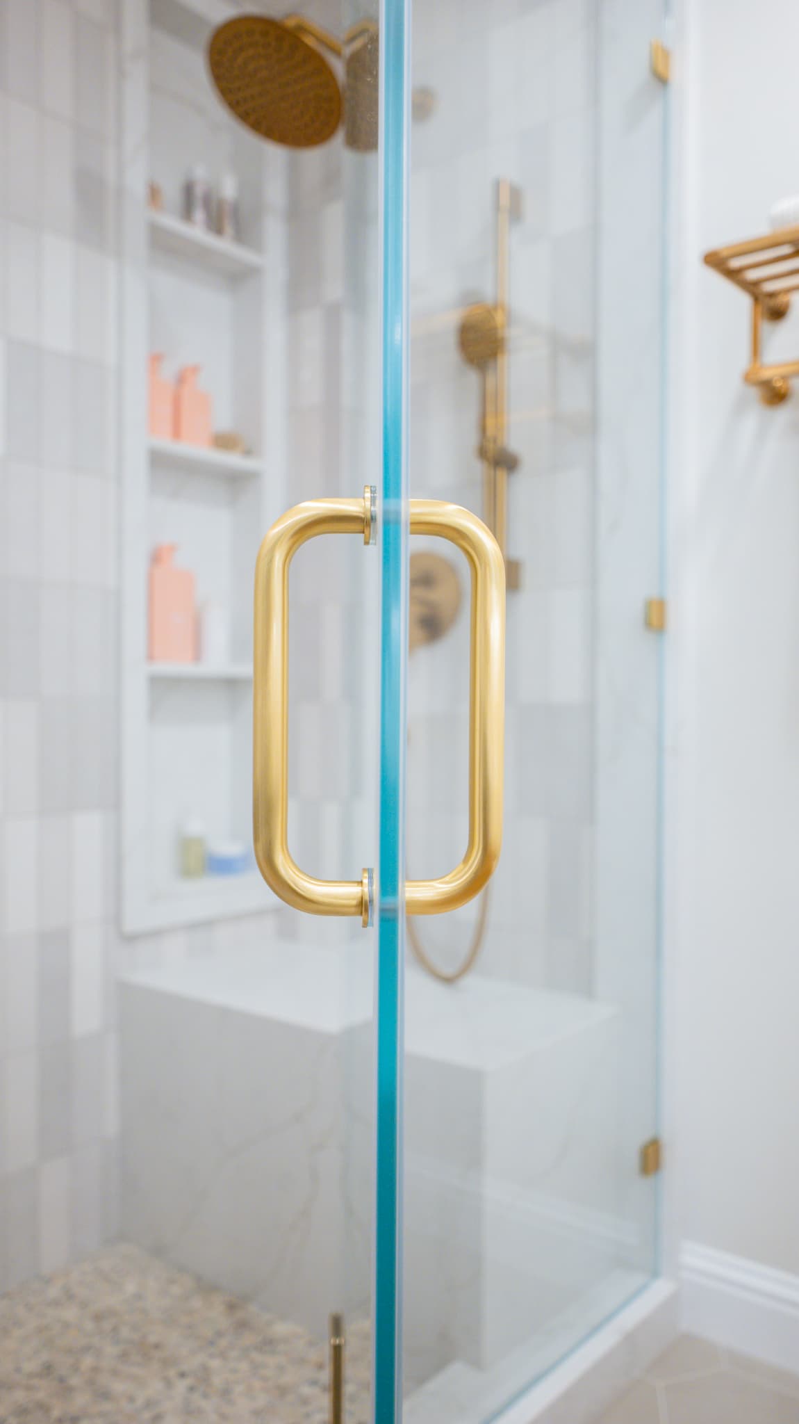 Kitchen Remodel in Sacramento — frameless glass shower, walk-in shower, rain shower head, handheld shower, shower bench