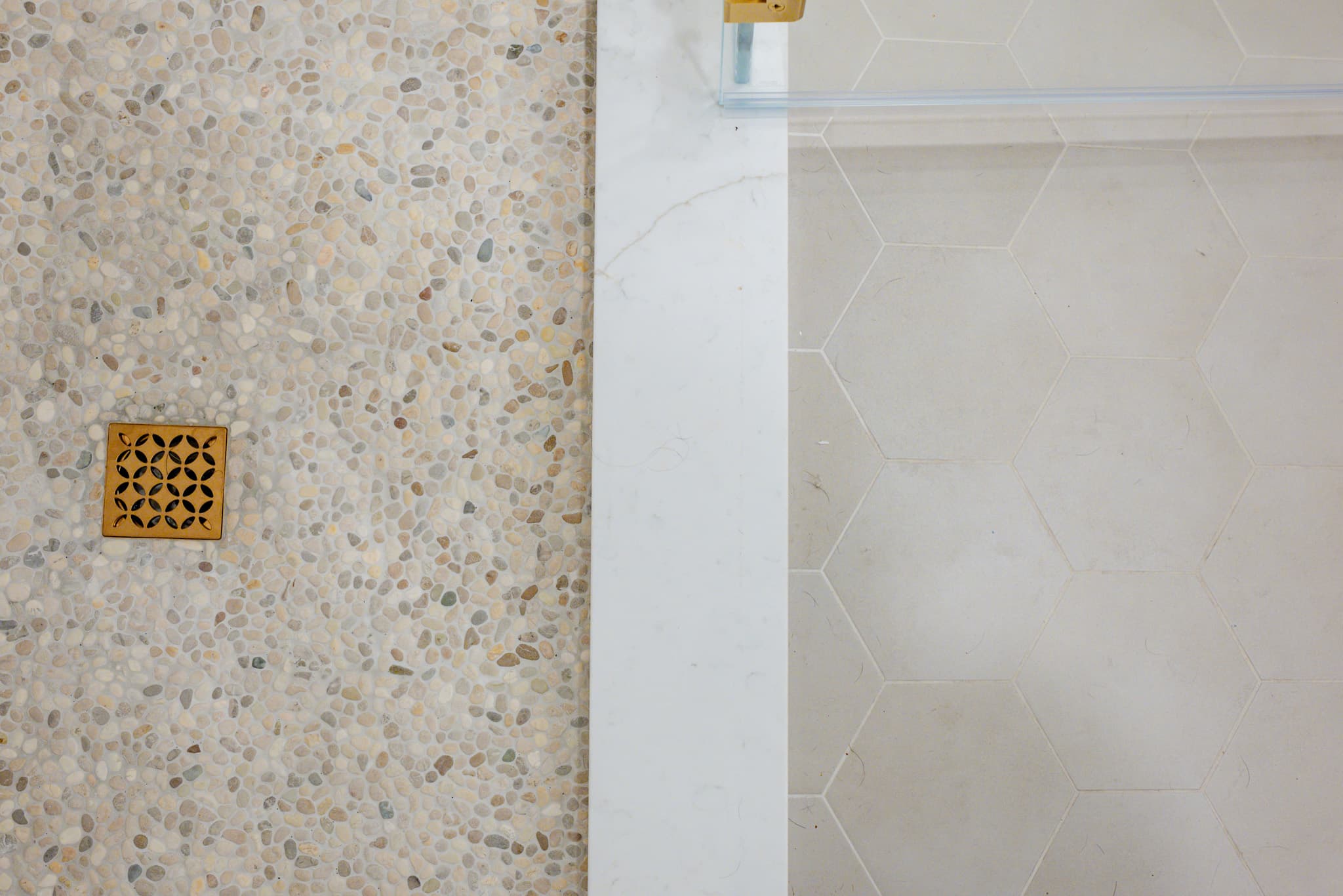 Kitchen Remodel in Sacramento — walk-in shower, frameless glass shower, mosaic backsplash, natural-stone tile flooring, tiled shower surround