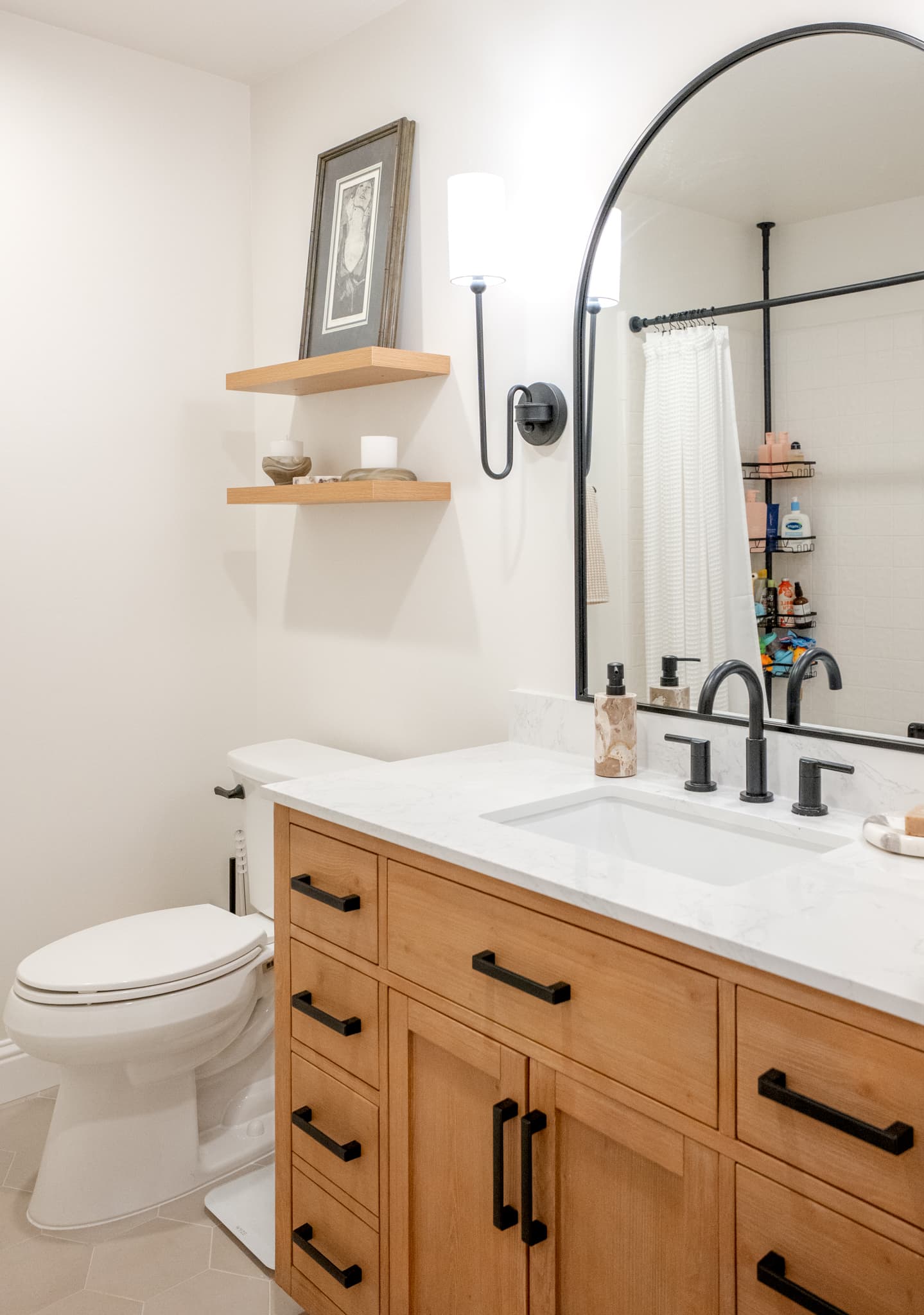 Kitchen Remodel in Sacramento — single vanity, undermount sink, quartz countertop, framed mirror, built-in shelving