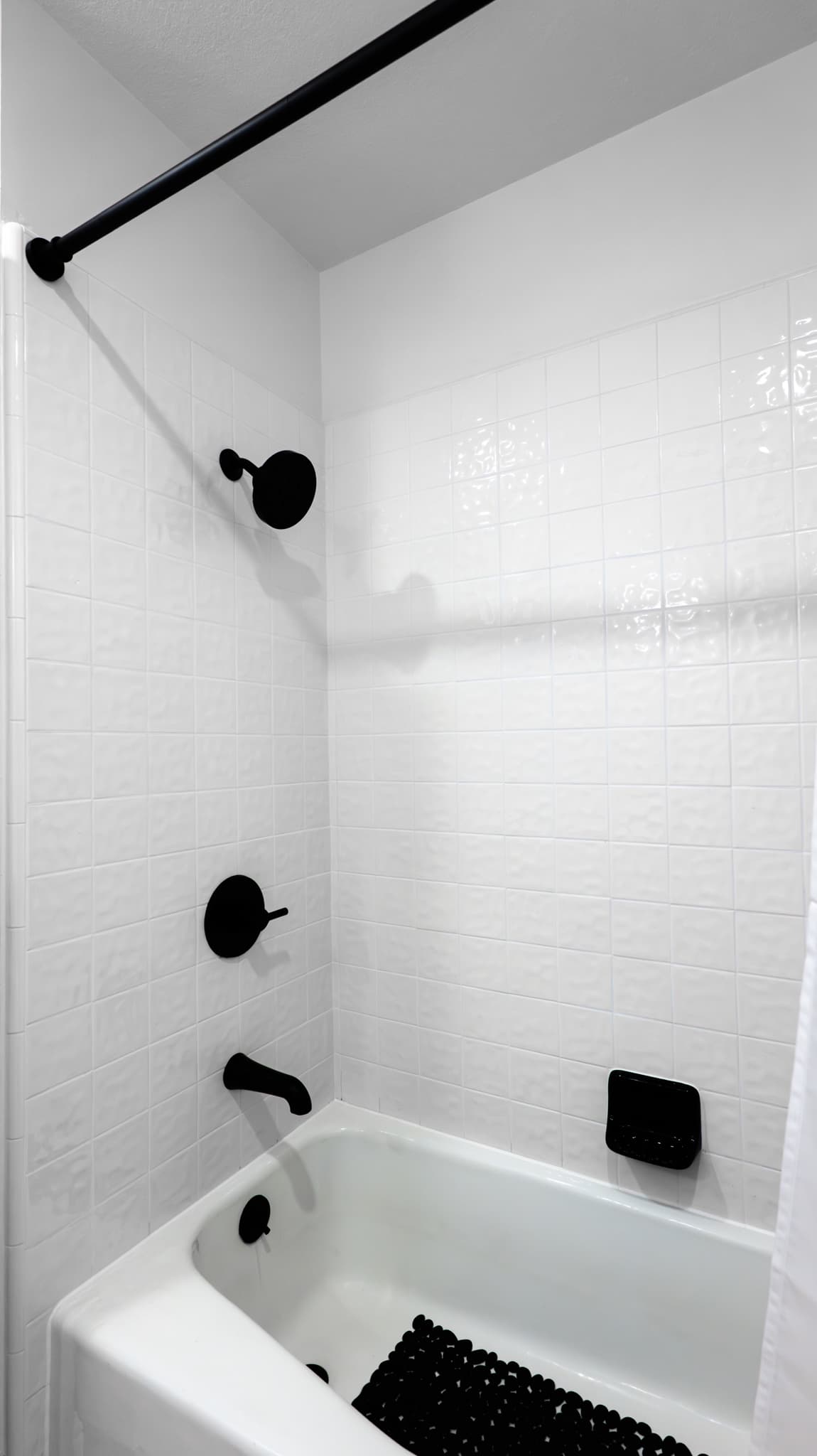 Kitchen Remodel in Sacramento — tiled shower surround, tub-to-shower conversion, soaking tub, rain shower head, subway tile backsplash
