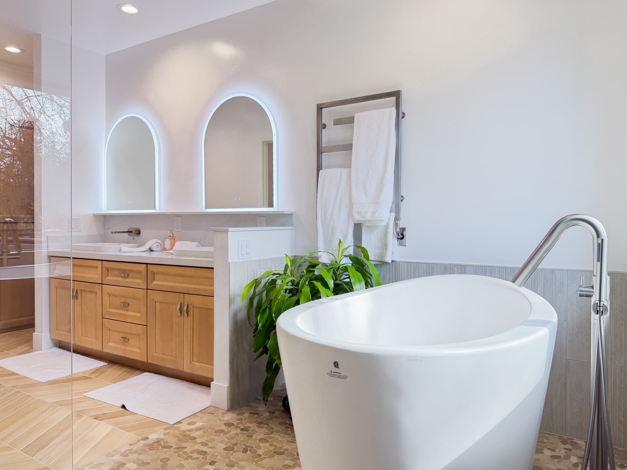 Bathroom Remodel in Carmichael — freestanding tub, double vanity, lighted mirror, recessed lighting, frameless glass shower