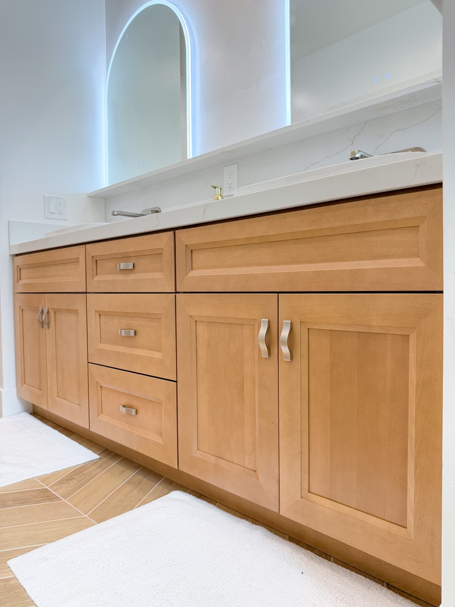 Bathroom Remodel in Carmichael — shaker cabinets, double vanity, quartz countertop, lighted mirror, porcelain tile flooring