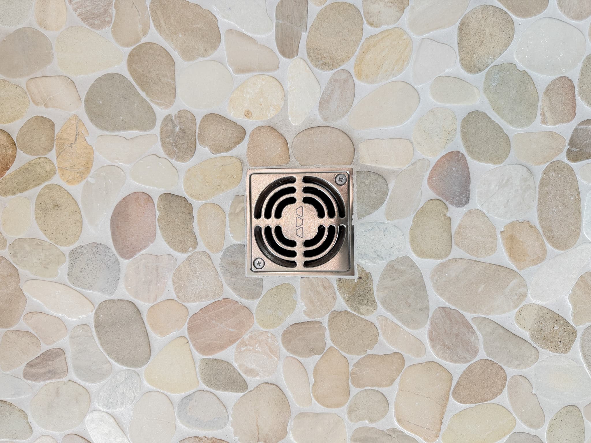Bathroom Remodel in Carmichael — walk-in shower, natural-stone tile flooring, mosaic backsplash, tiled shower surround