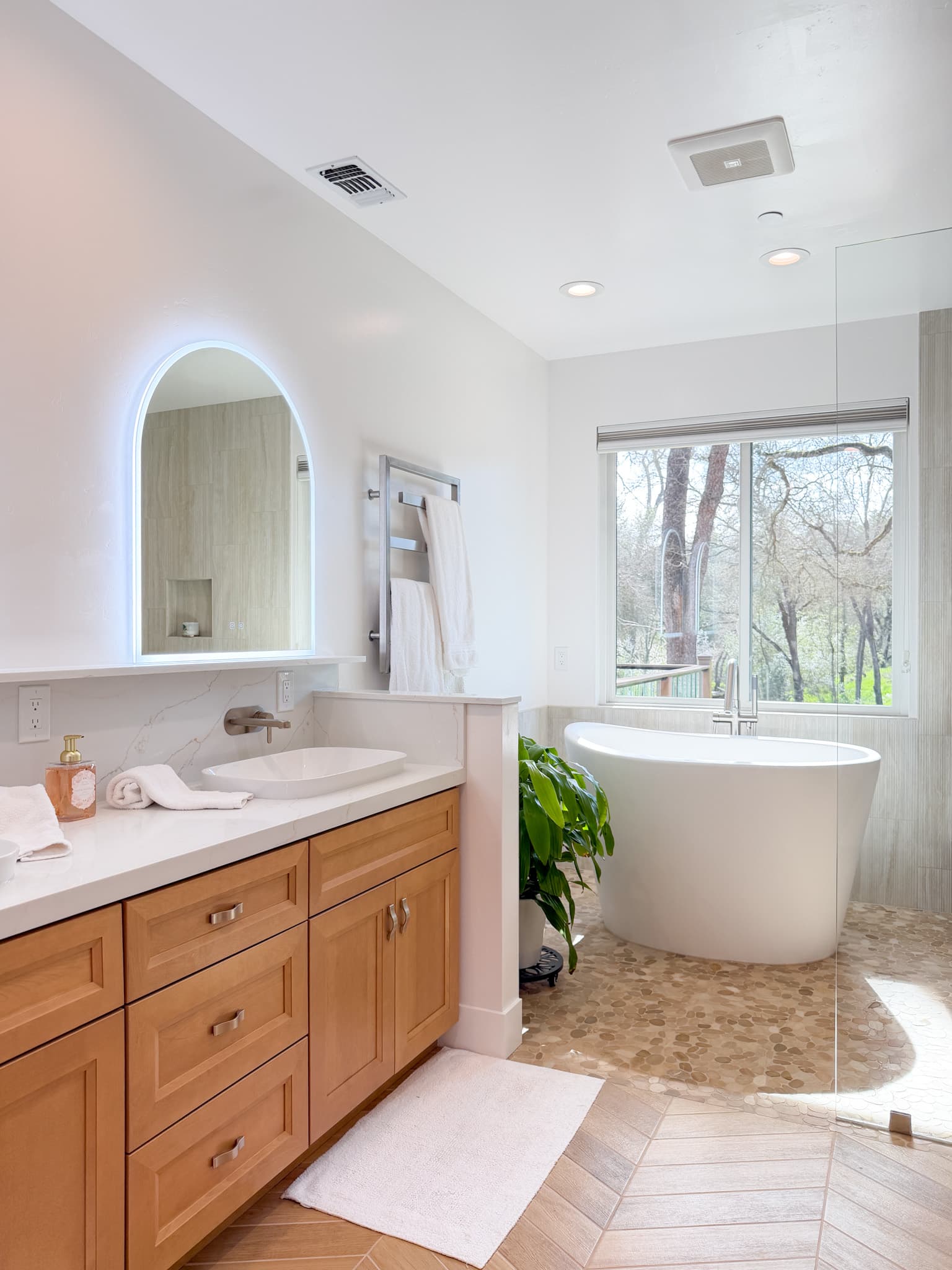 Bathroom Remodel in Carmichael — freestanding tub, lighted mirror, vessel sink, frameless glass shower, recessed lighting