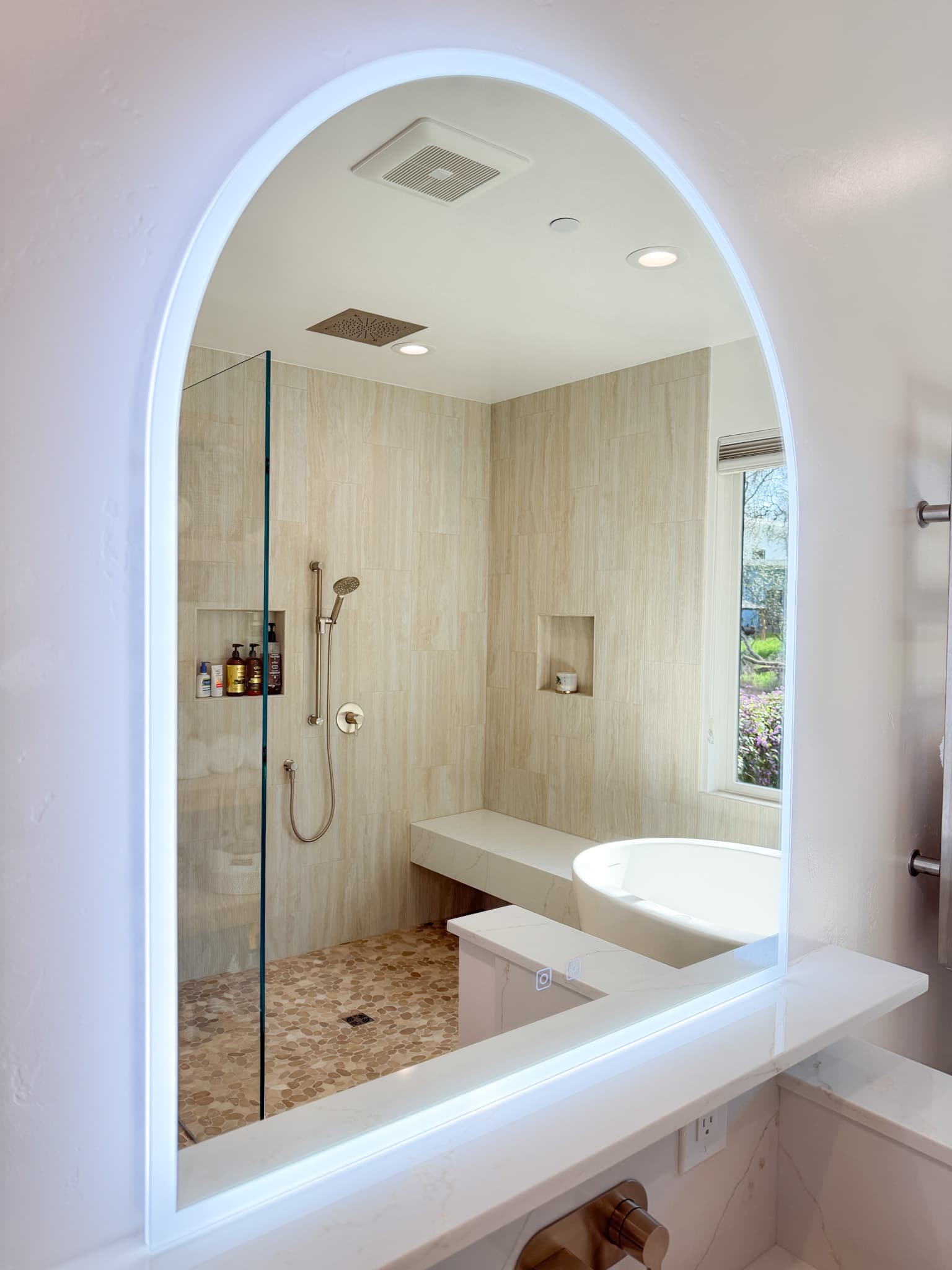 Bathroom Remodel in Carmichael — lighted mirror, walk-in shower, frameless glass shower, rain shower head, freestanding tub