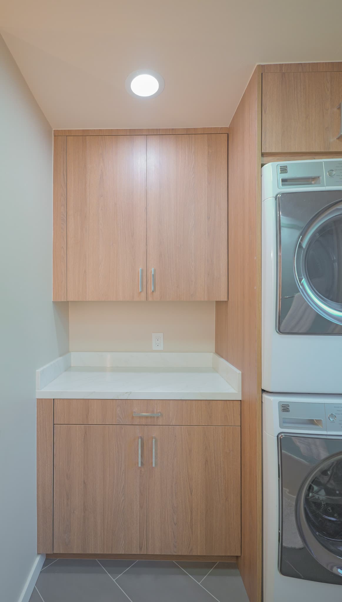 House Renovation in Sacramento — custom cabinetry, quartz countertop, recessed lighting, linen tower, ceramic tile flooring