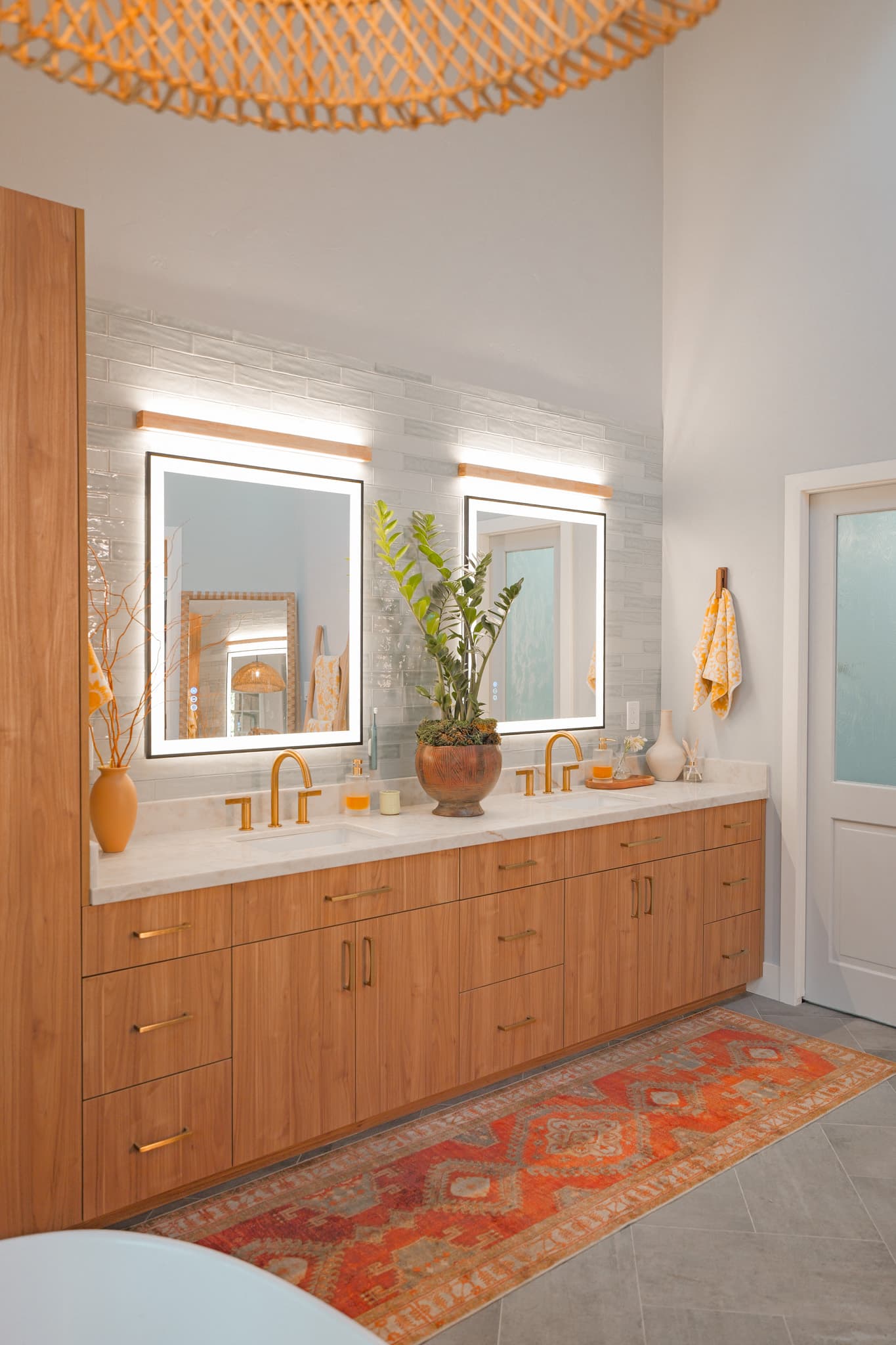 House Renovation in Sacramento — double vanity, lighted mirror, custom cabinetry, linen tower, undermount sink