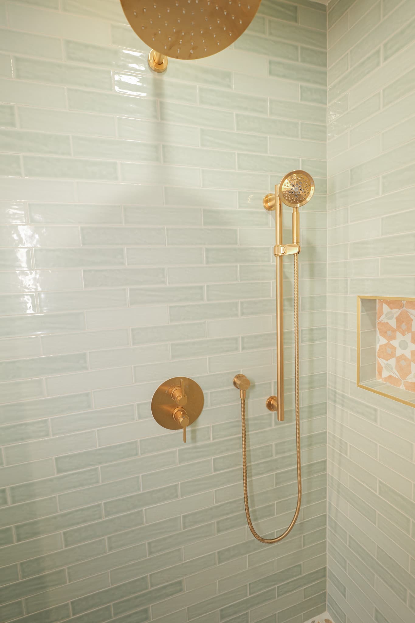 House Renovation in Sacramento — tiled shower surround, rain shower head, handheld shower, walk-in shower, mosaic backsplash