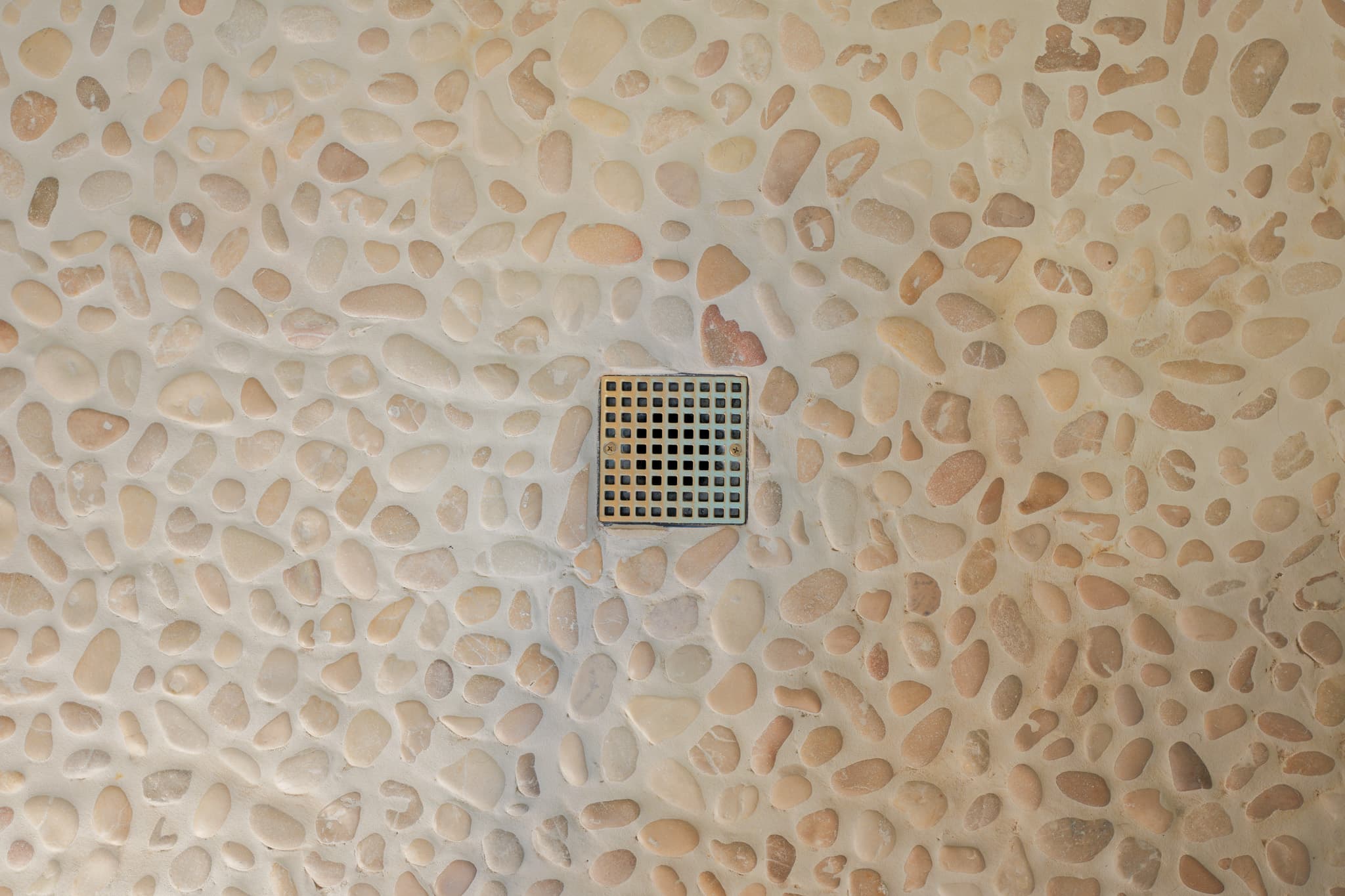 House Renovation in Sacramento — walk-in shower, natural-stone tile flooring, mosaic backsplash, tiled shower surround