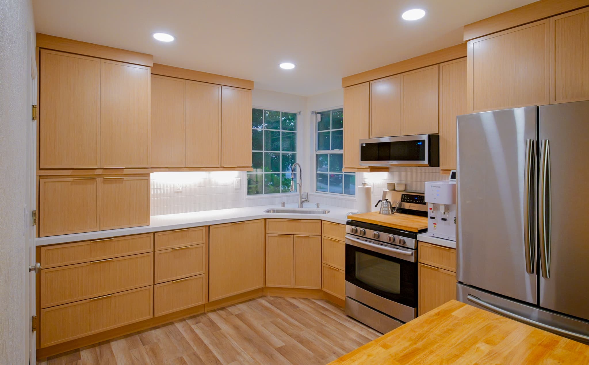 Kitchen Remodel in Antelope — shaker cabinets, recessed lighting, under-cabinet lighting, stainless appliances, butcher-block countertop