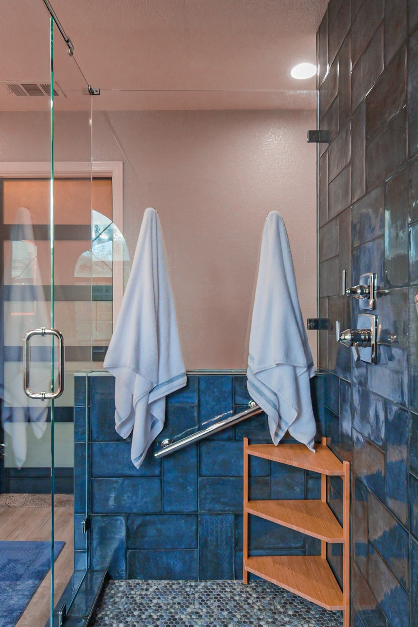 Bathroom Remodel in Sacramento — frameless glass shower, tiled shower surround, walk-in shower, shower bench, mosaic backsplash