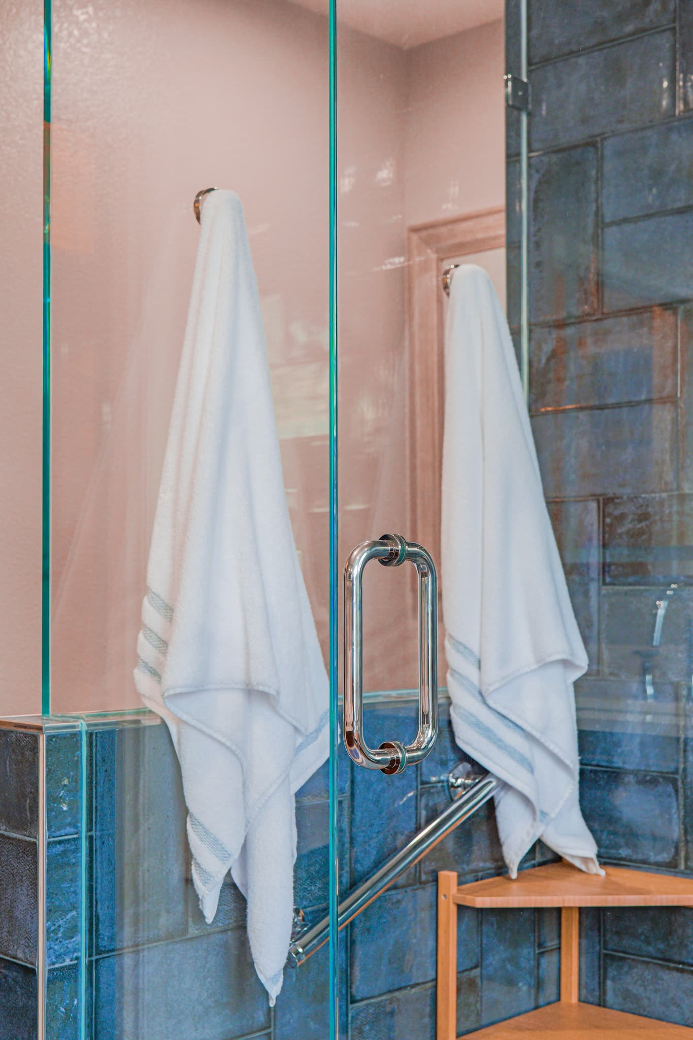 Bathroom Remodel in Sacramento — frameless glass shower, tiled shower surround, walk-in shower, shower bench, ceramic tile flooring