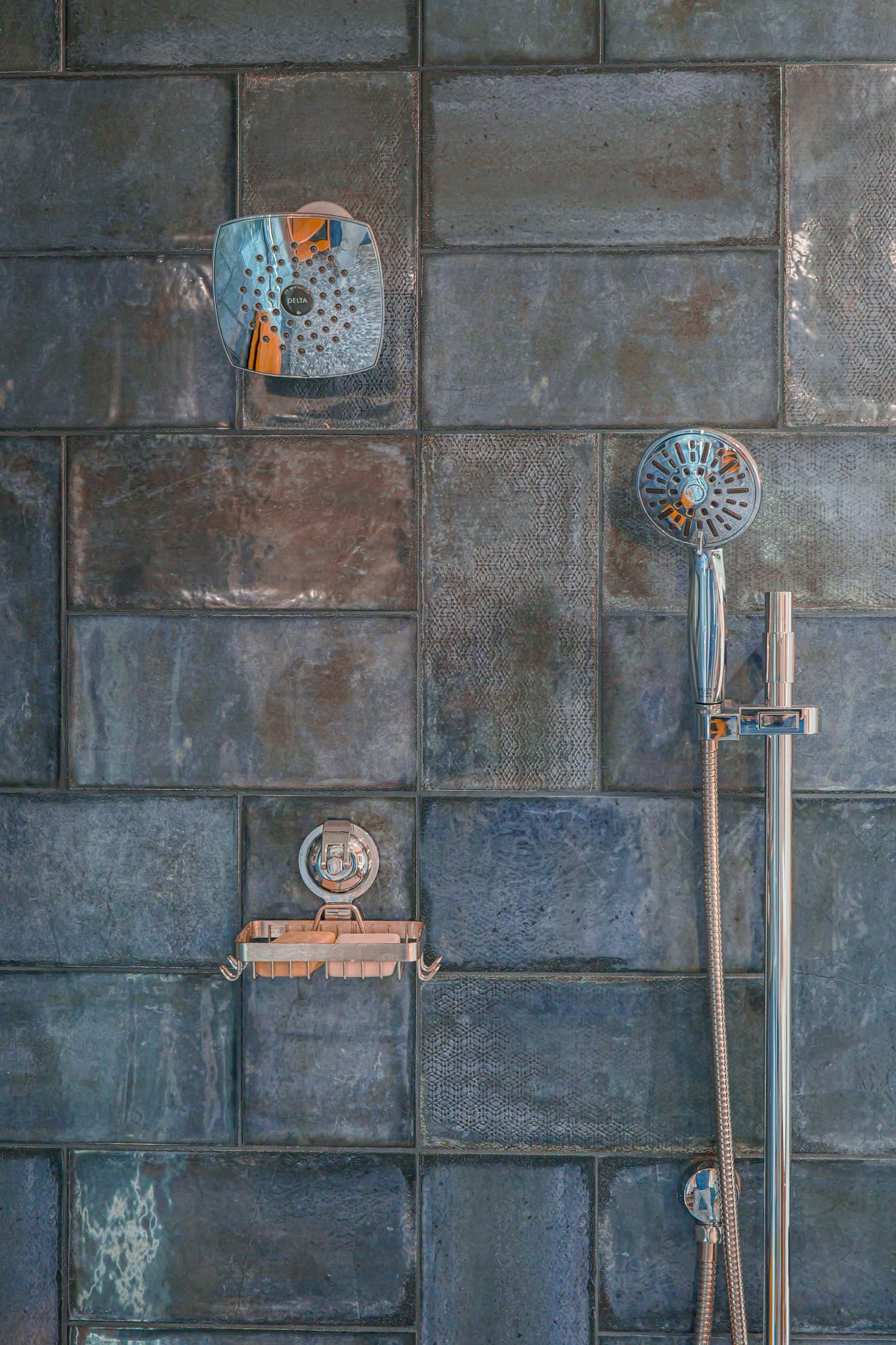 Bathroom Remodel in Sacramento — tiled shower surround, handheld shower, rain shower head, walk-in shower, natural-stone tile flooring