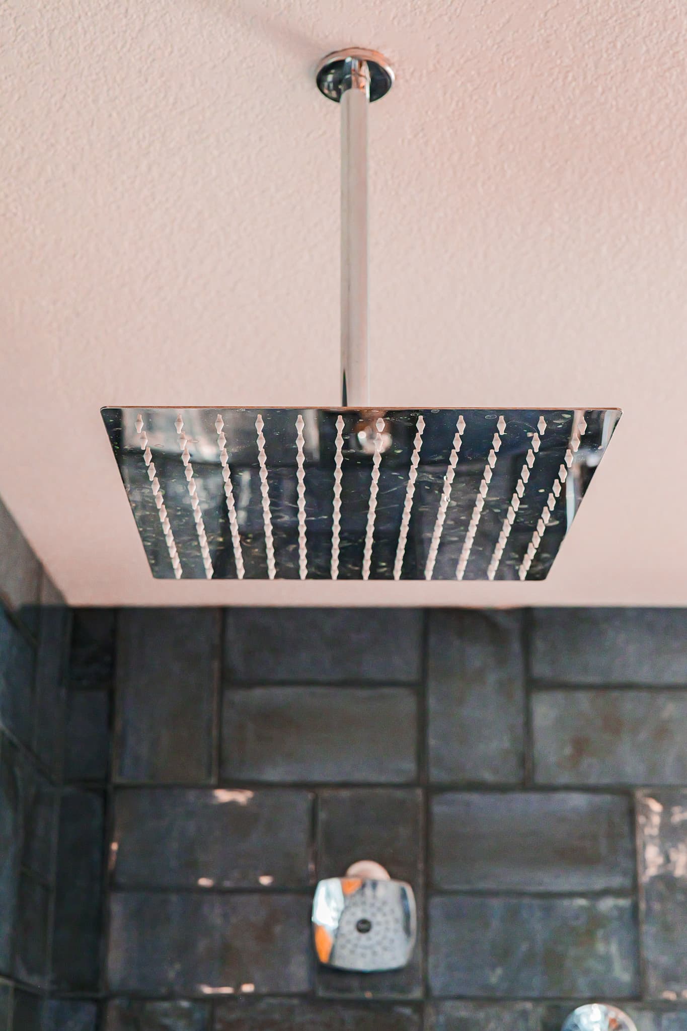 Bathroom Remodel in Sacramento — rain shower head, tiled shower surround, walk-in shower, handheld shower, ceramic tile flooring