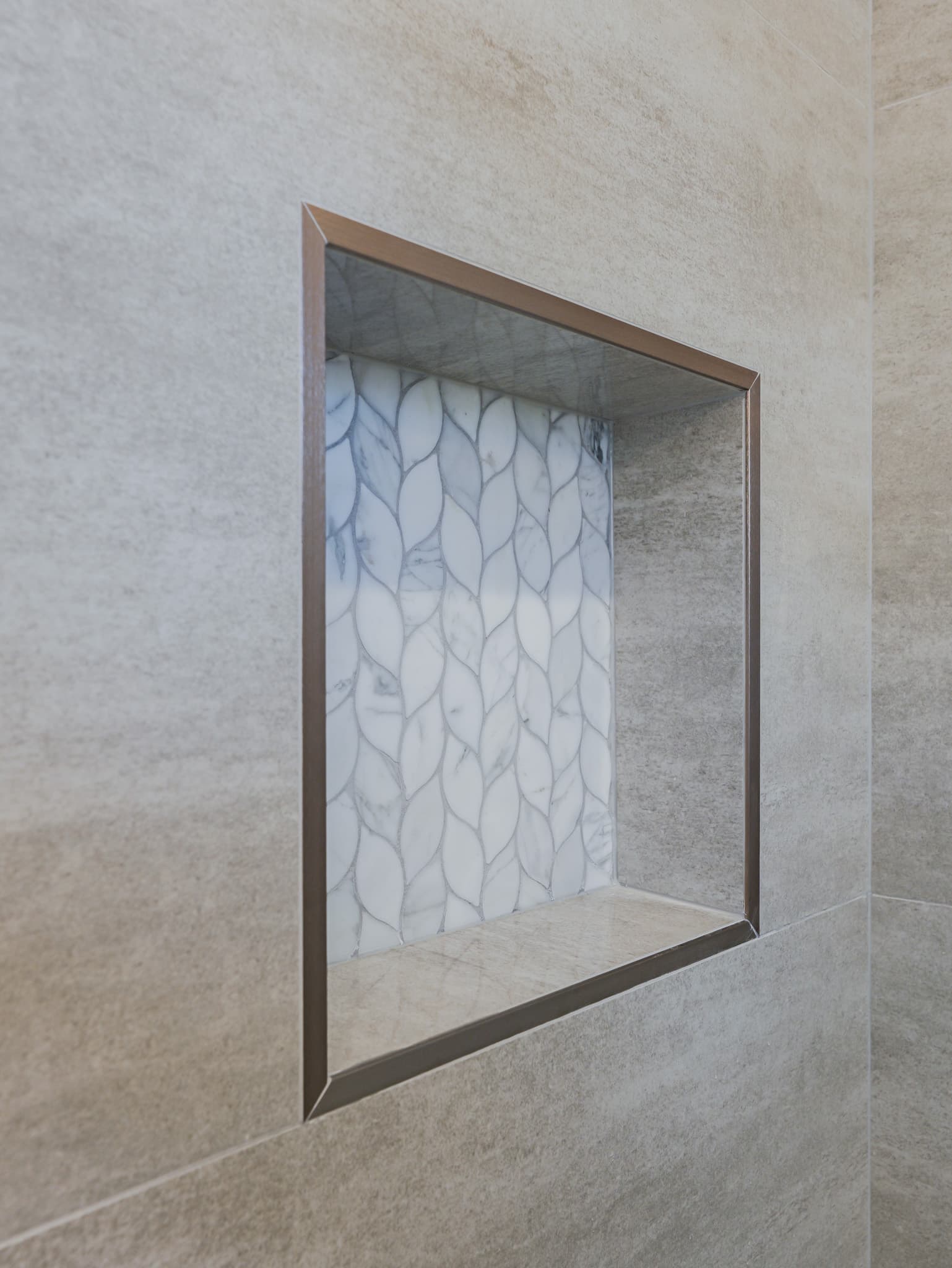 Bathroom Remodel in Sacramento — walk-in shower, tiled shower surround, mosaic backsplash, natural-stone backsplash, porcelain tile flooring
